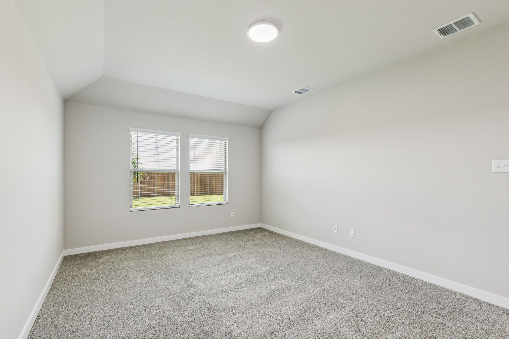 Primary Suite in the Harper home plan by Trophy Signature Homes – REPRESENTATIVE PHOTO