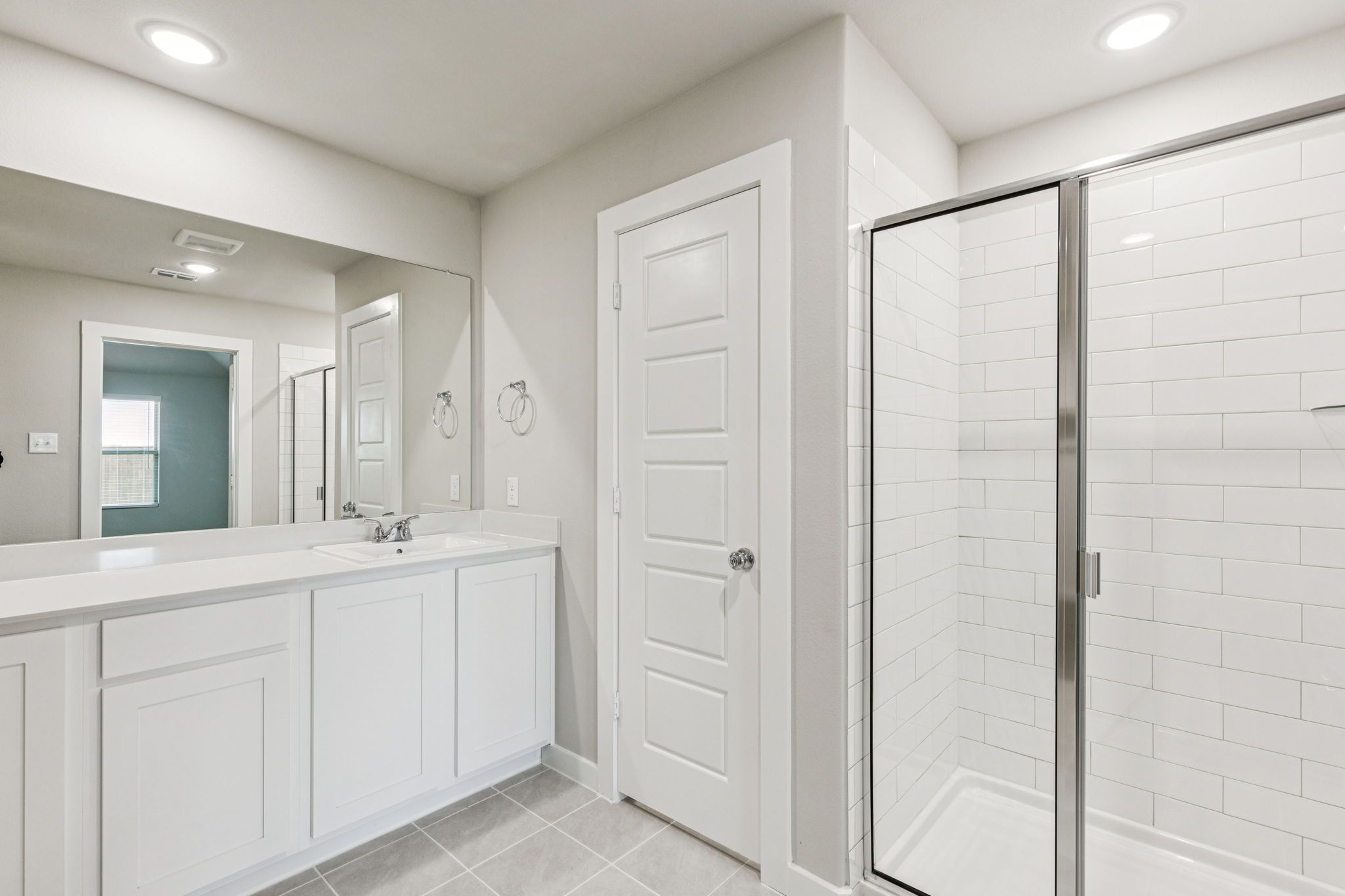 Primary Bathroom in the Harper home plan by Trophy Signature Homes – REPRESENTATIVE PHOTO