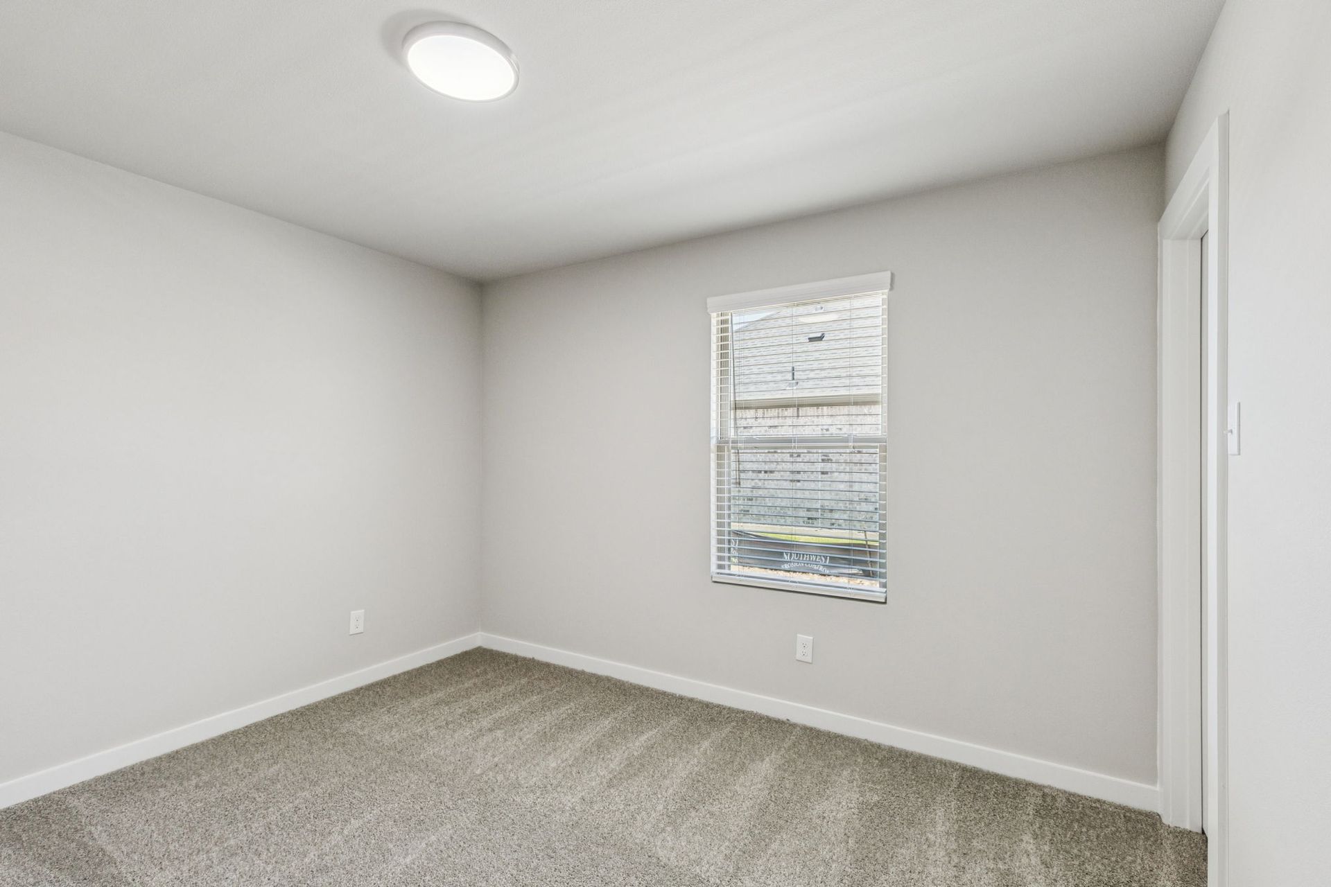 Bedroom in the Harper home plan by Trophy Signature Homes – REPRESENTATIVE PHOTO