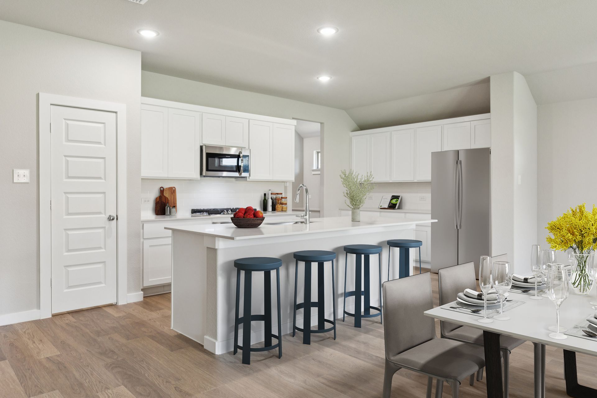 Kitchen in the Heisman home plan by Trophy Signature Homes – REPRESENTATIVE PHOTO
