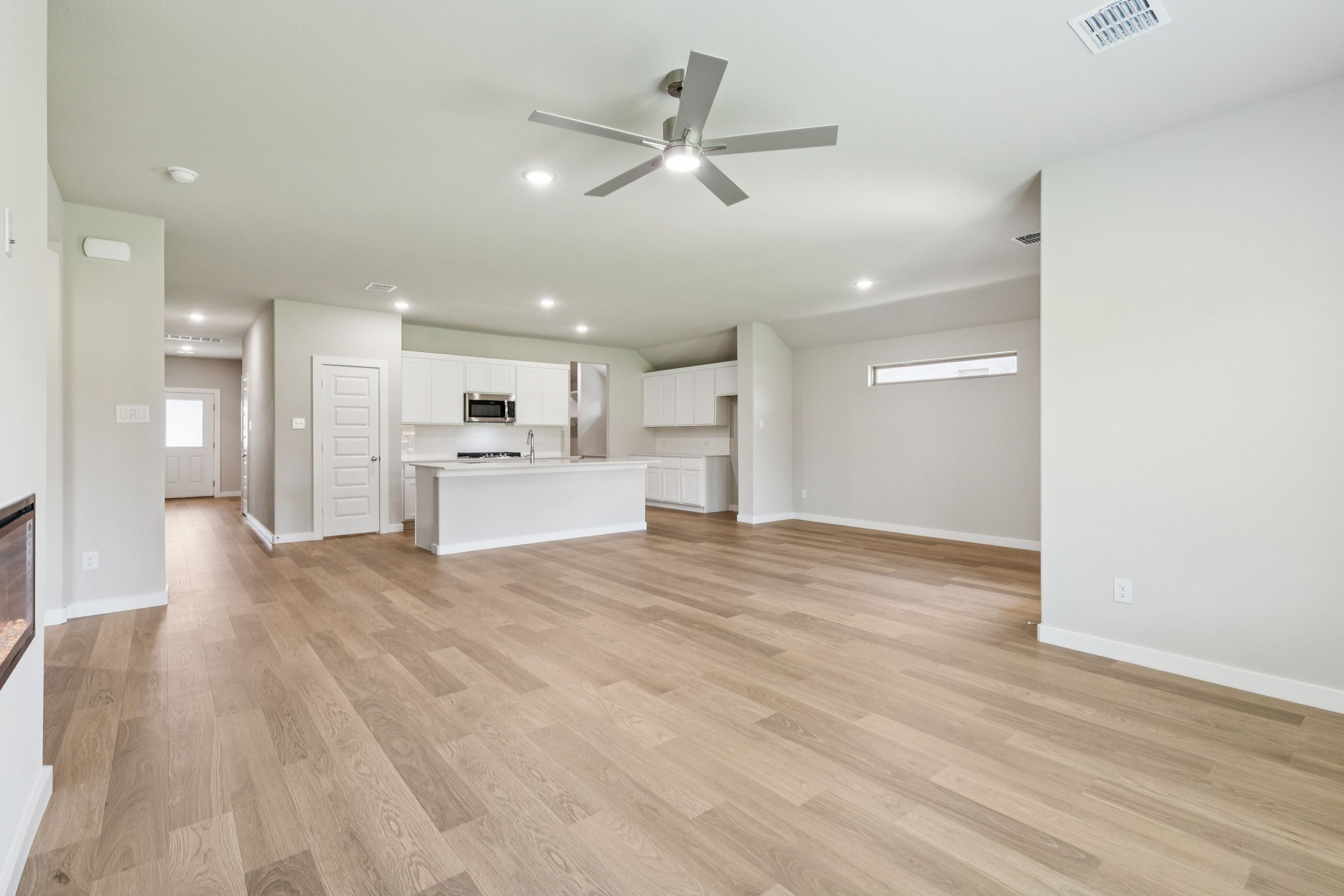 Open Floorplan in the Heisman home plan by Trophy Signature Homes – REPRESENTATIVE PHOTO