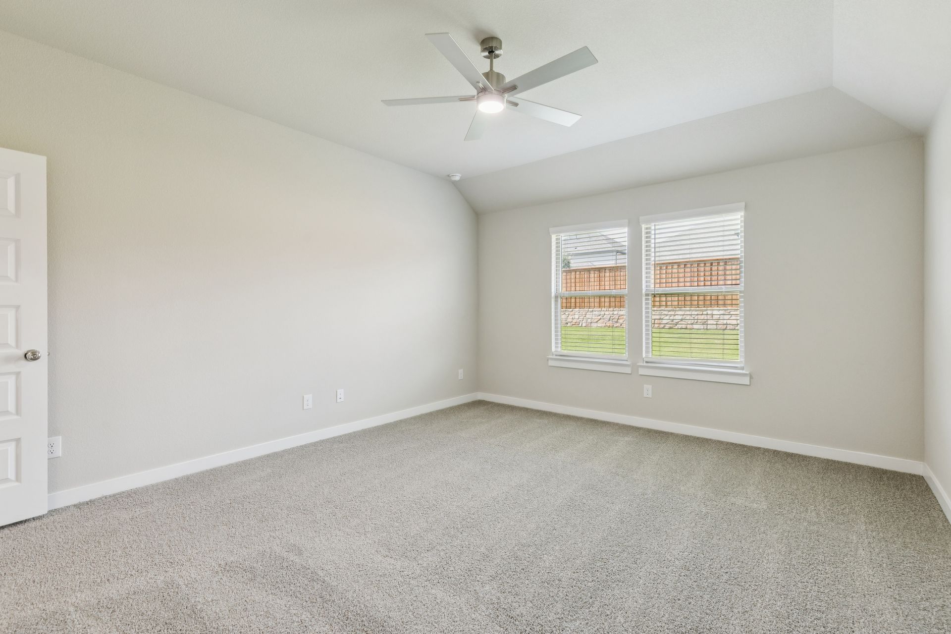 Primary Suite in the Heisman home plan by Trophy Signature Homes – REPRESENTATIVE PHOTO