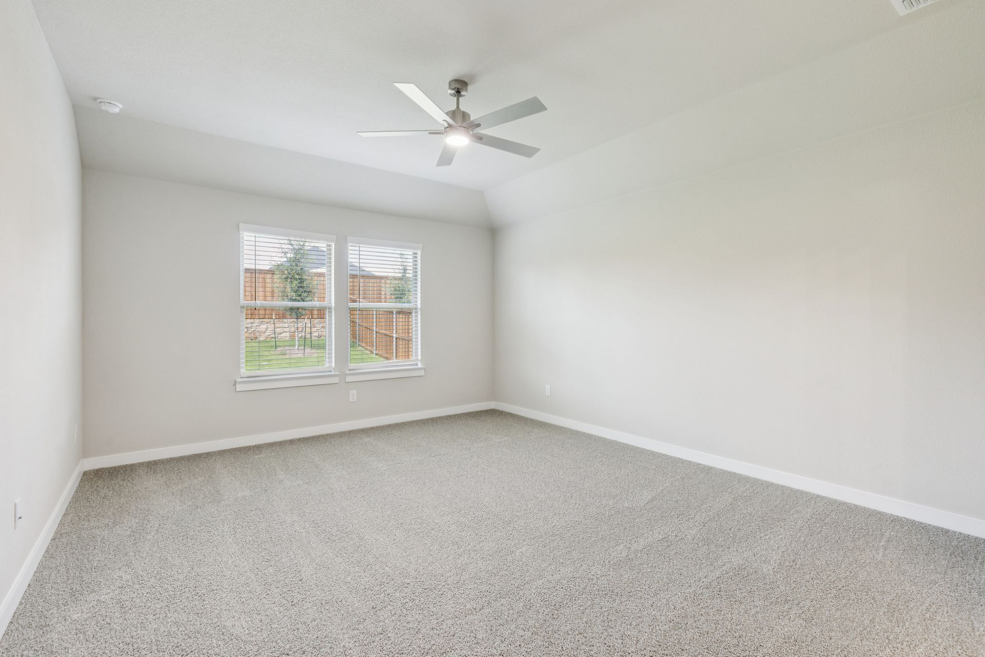 Primary Suite in the Heisman home plan by Trophy Signature Homes – REPRESENTATIVE PHOTO