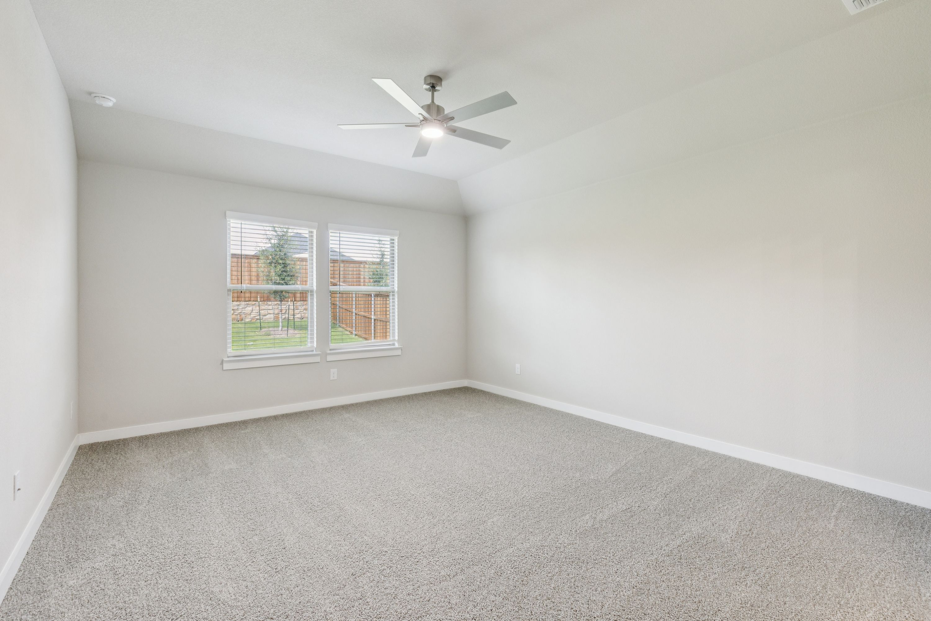 Primary Suite in the Heisman home plan by Trophy Signature Homes – REPRESENTATIVE PHOTO