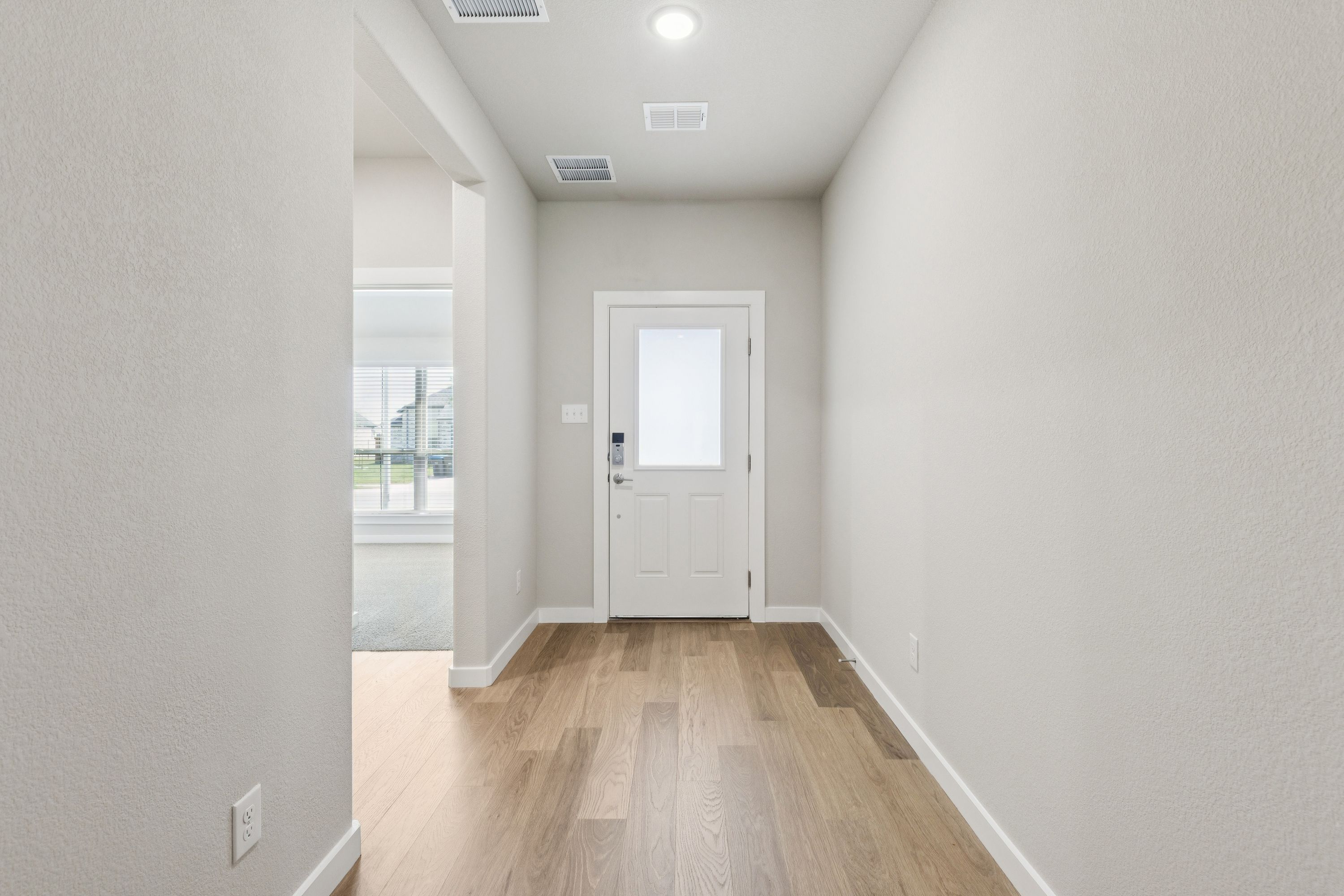 Entryway in the Heisman home plan by Trophy Signature Homes – REPRESENTATIVE PHOTO
