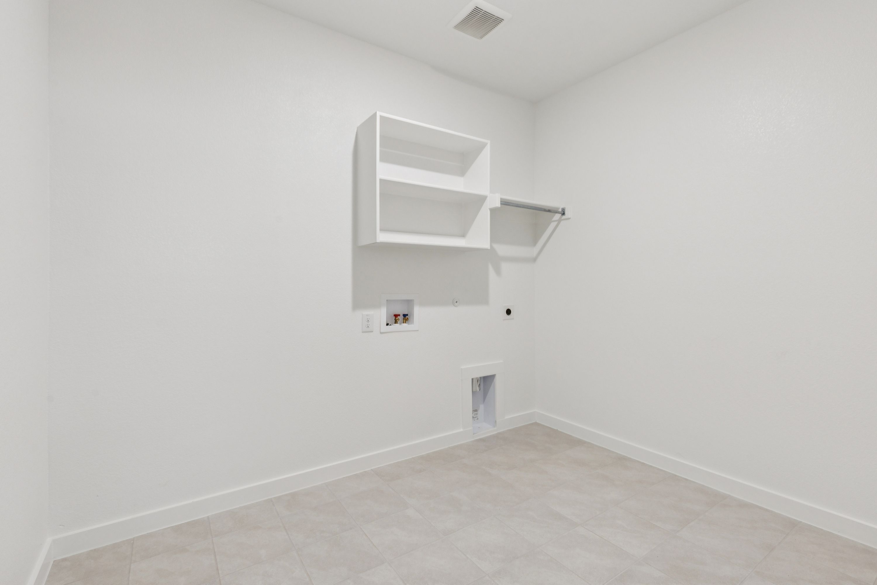 Utility in the Heisman home plan by Trophy Signature Homes – REPRESENTATIVE PHOTO