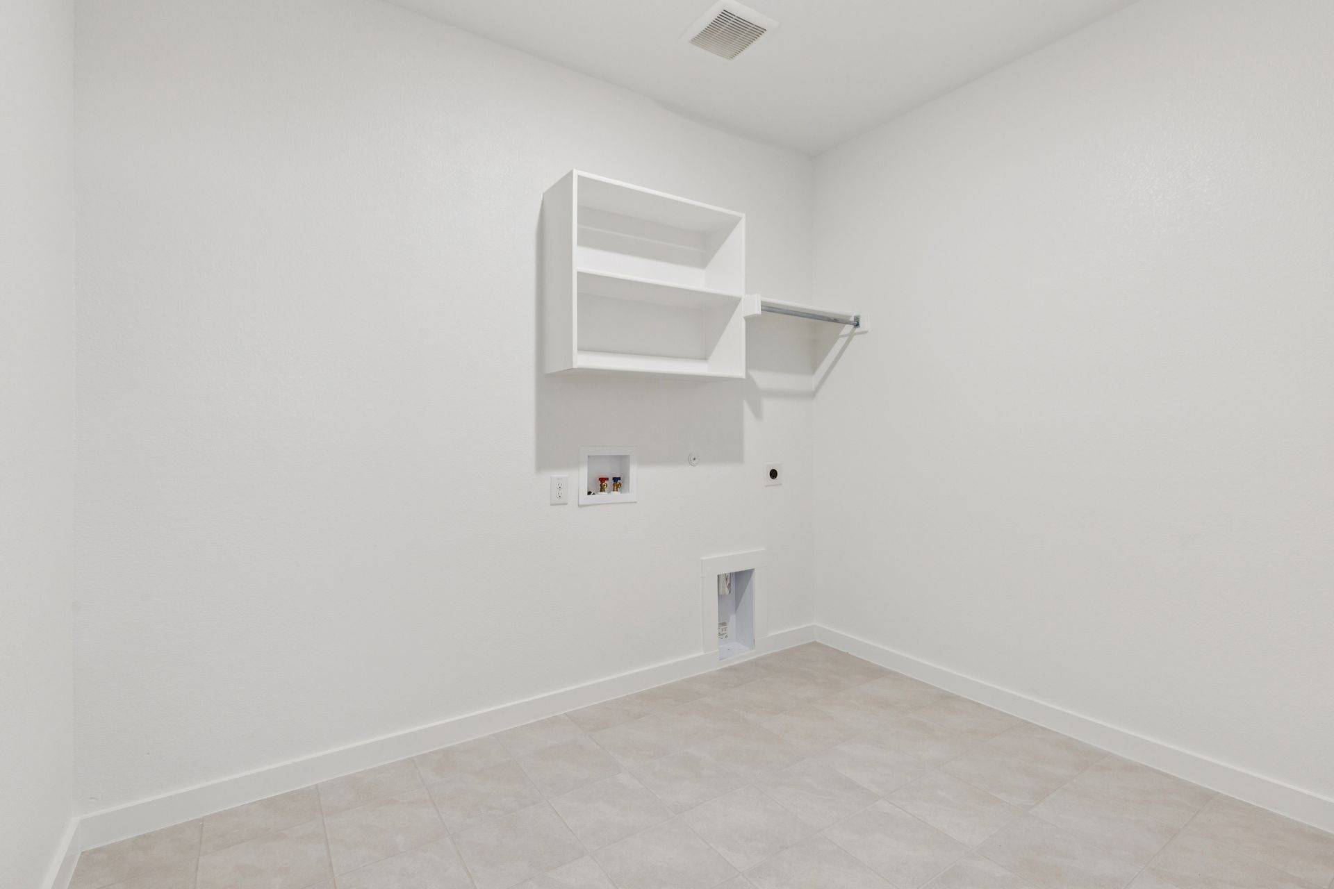 Utility in the Heisman home plan by Trophy Signature Homes – REPRESENTATIVE PHOTO