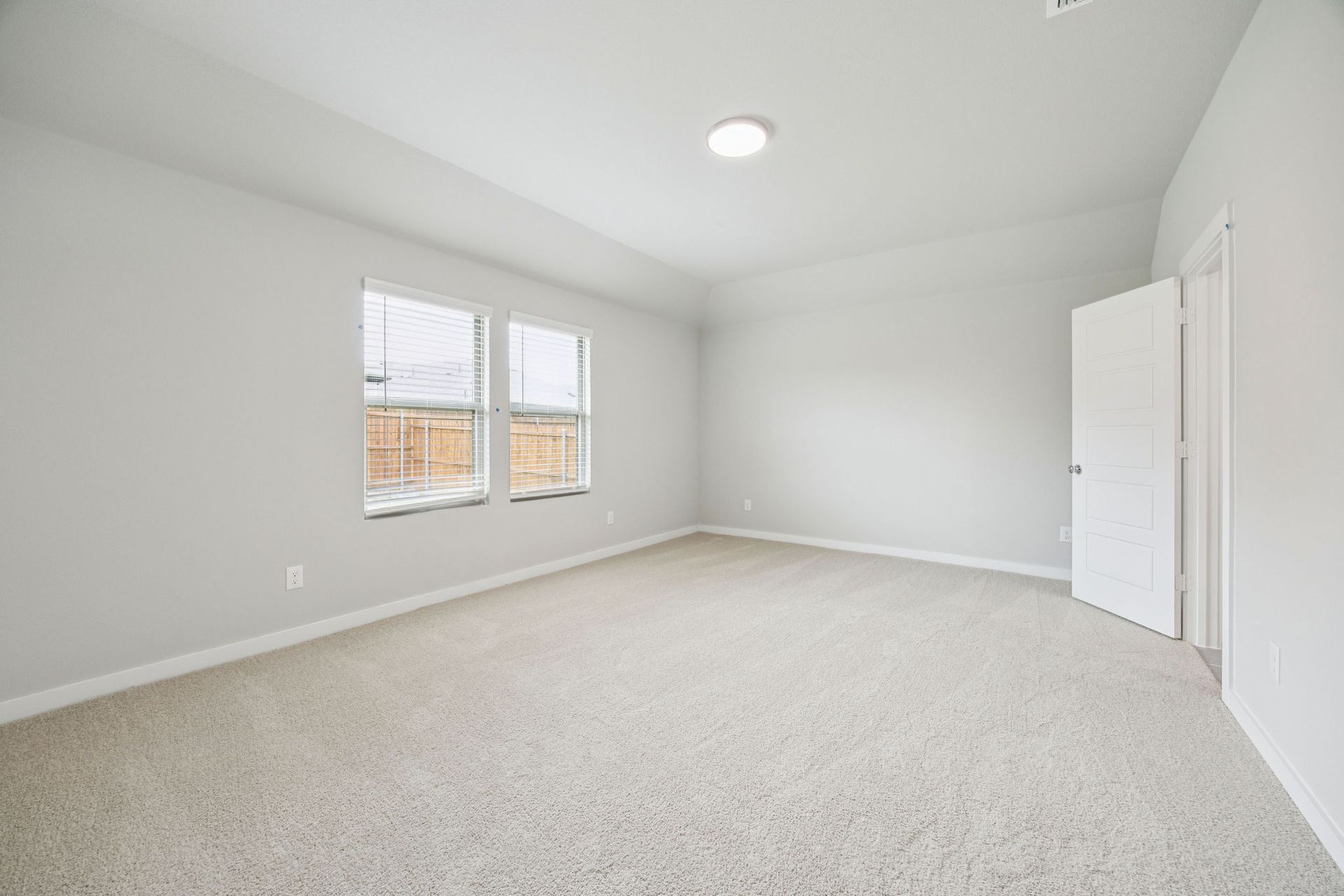 Primary Suite in the Hayden home plan by Trophy Signature Homes – REPRESENTATIVE PHOTO