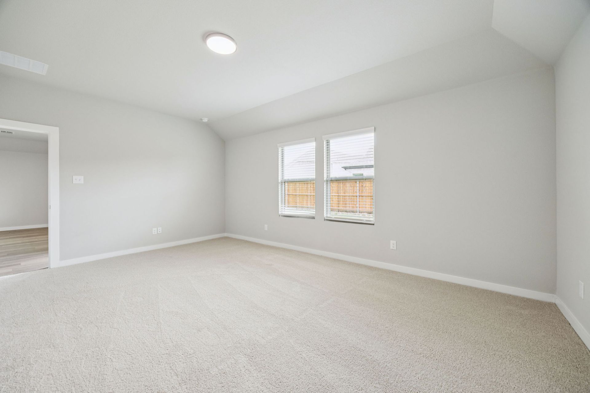 Primary Suite in the Hayden home plan by Trophy Signature Homes – REPRESENTATIVE PHOTO
