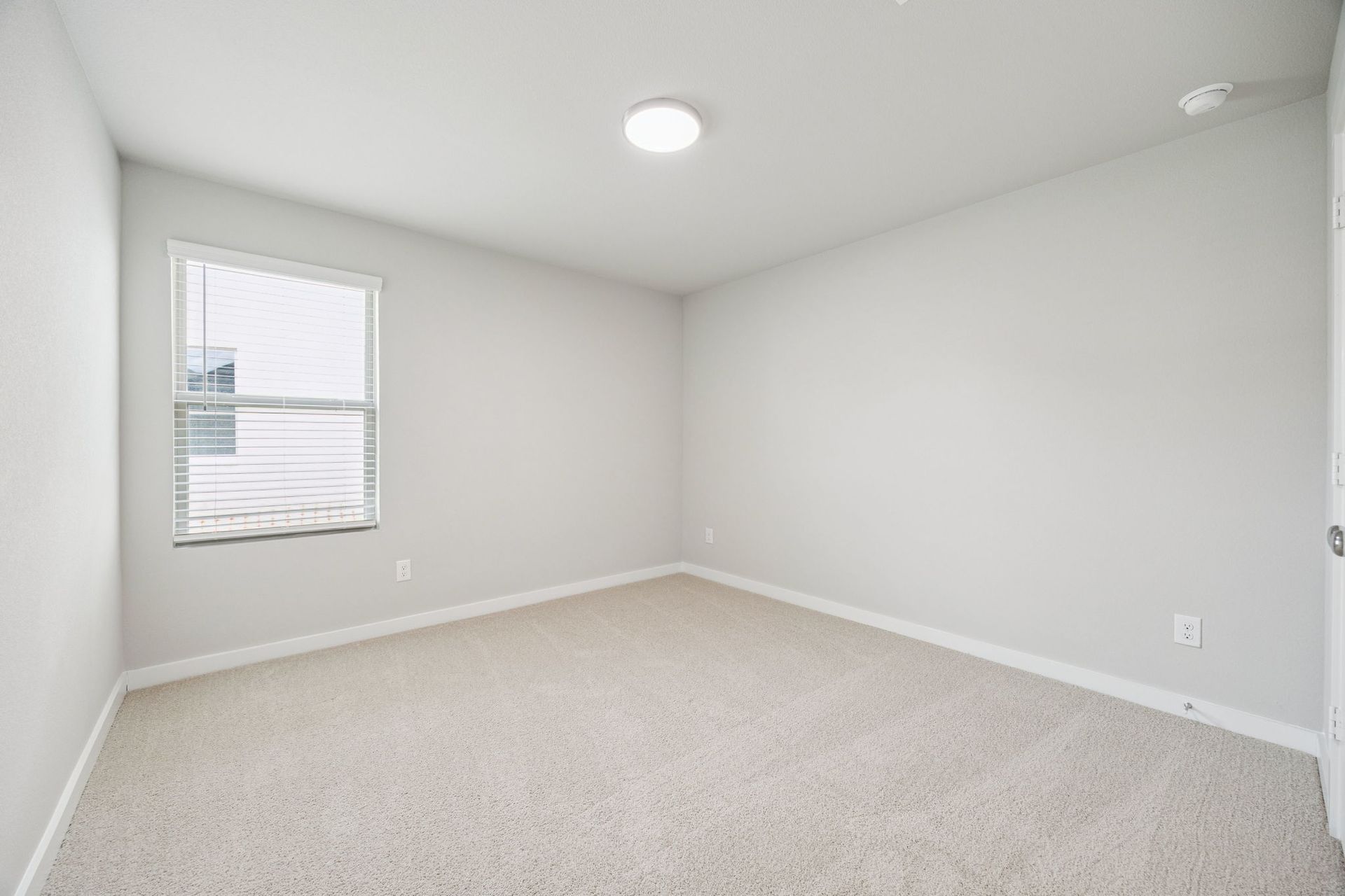 Bedroom in the Hayden home plan by Trophy Signature Homes – REPRESENTATIVE PHOTO