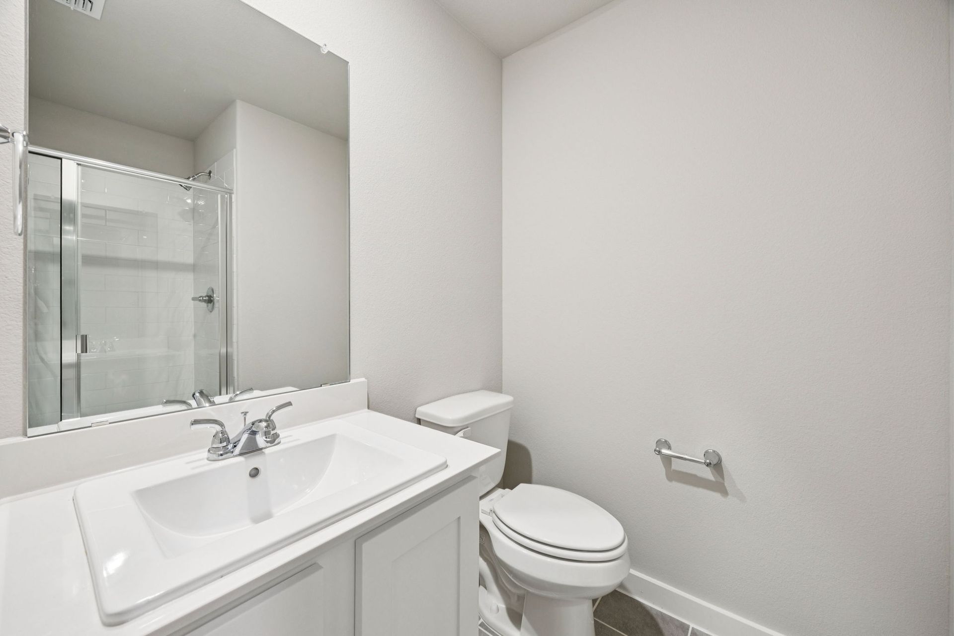 Bathroom in the Hayden home plan by Trophy Signature Homes – REPRESENTATIVE PHOTO