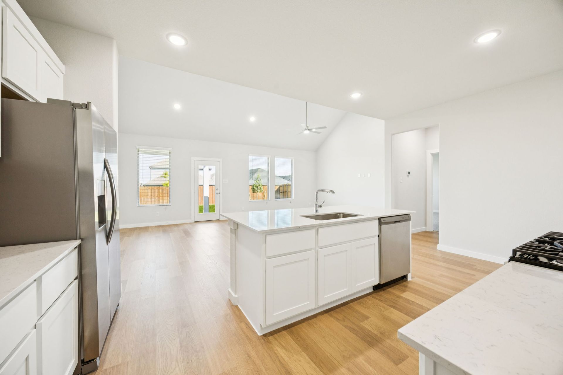 Kitchen in the Masters home plan by Trophy Signature Homes – REPRESENTATIVE PHOTO