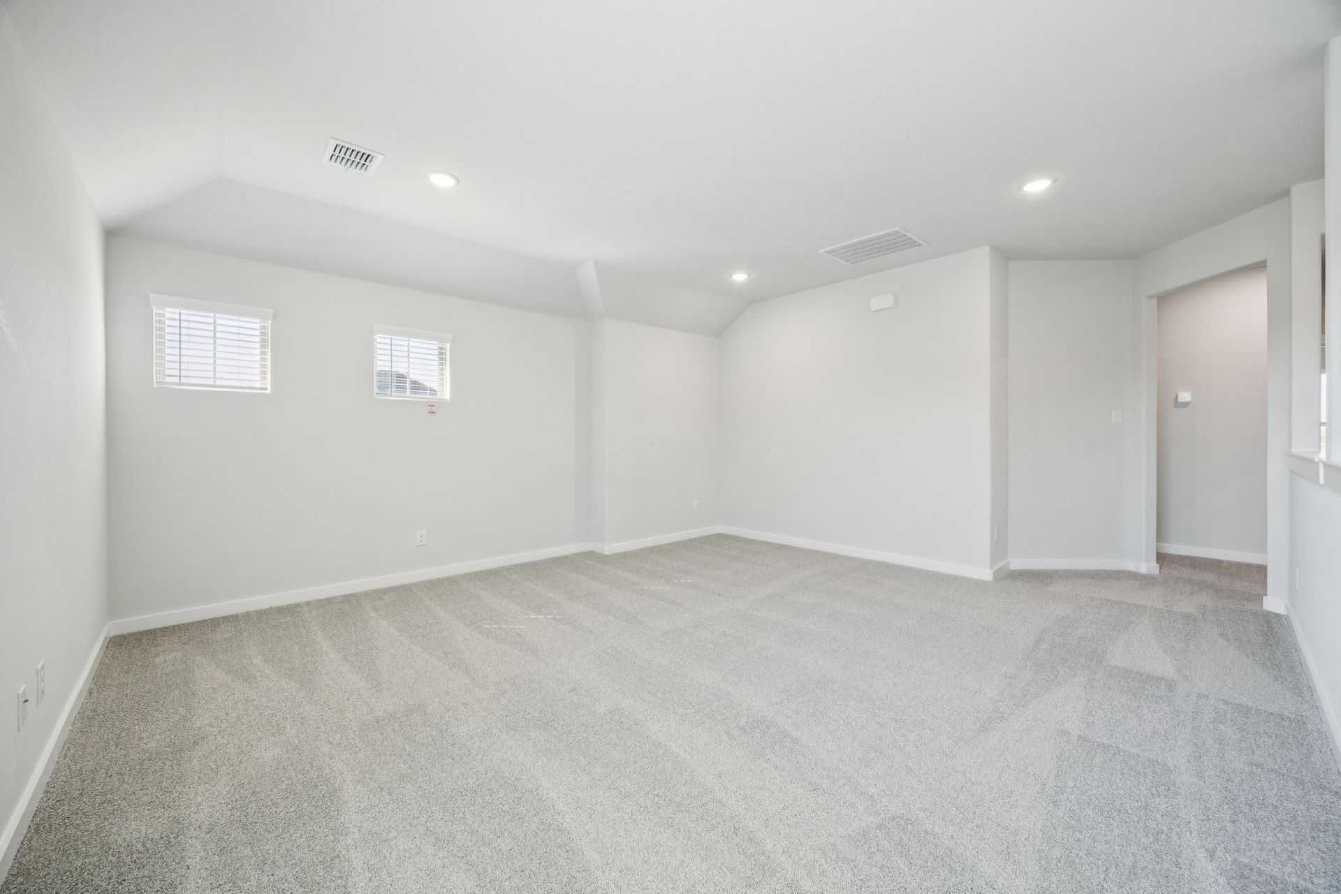 Game room in the Masters home plan by Trophy Signature Homes – REPRESENTATIVE PHOTO