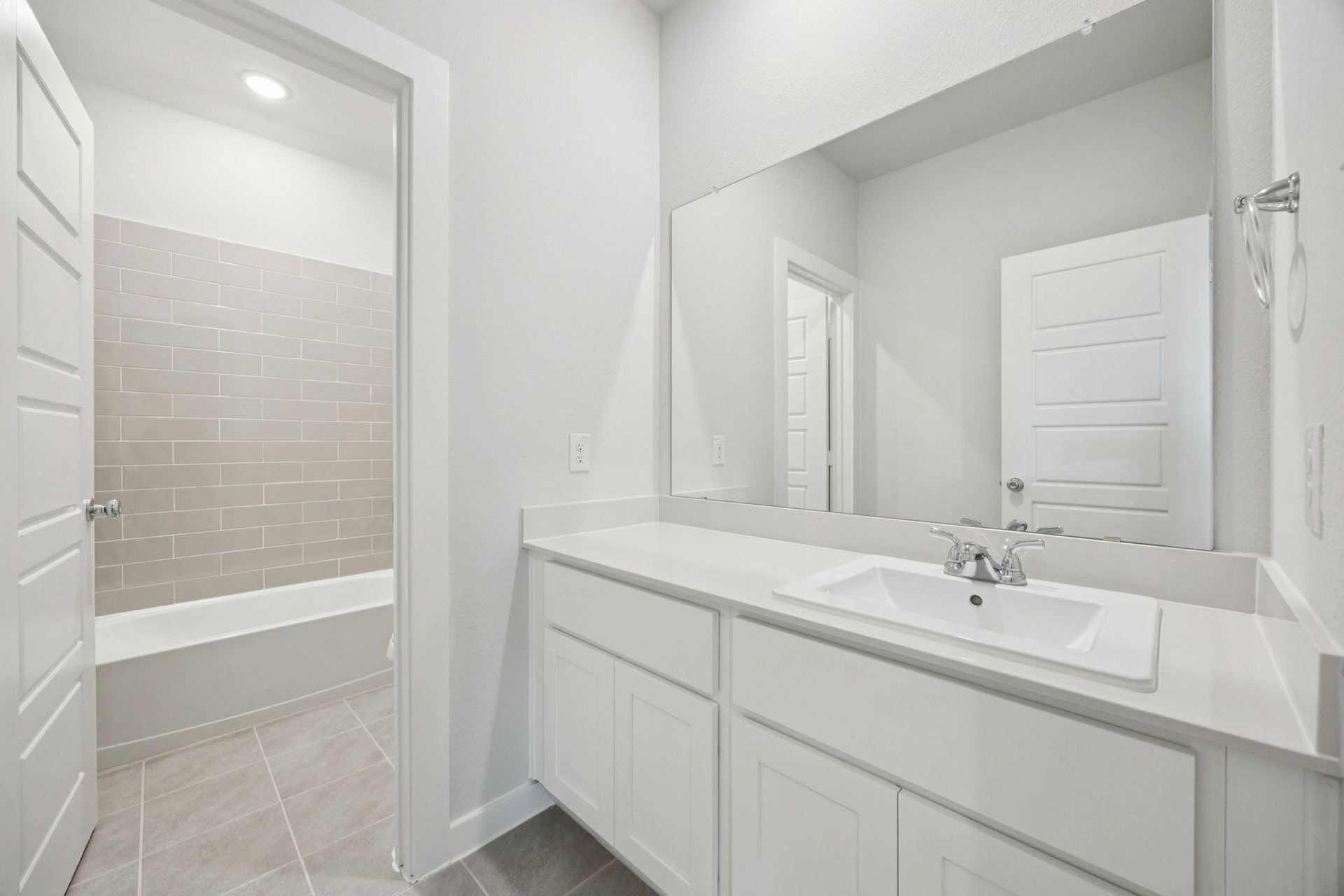 Bathroom in the Masters home plan by Trophy Signature Homes – REPRESENTATIVE PHOTO