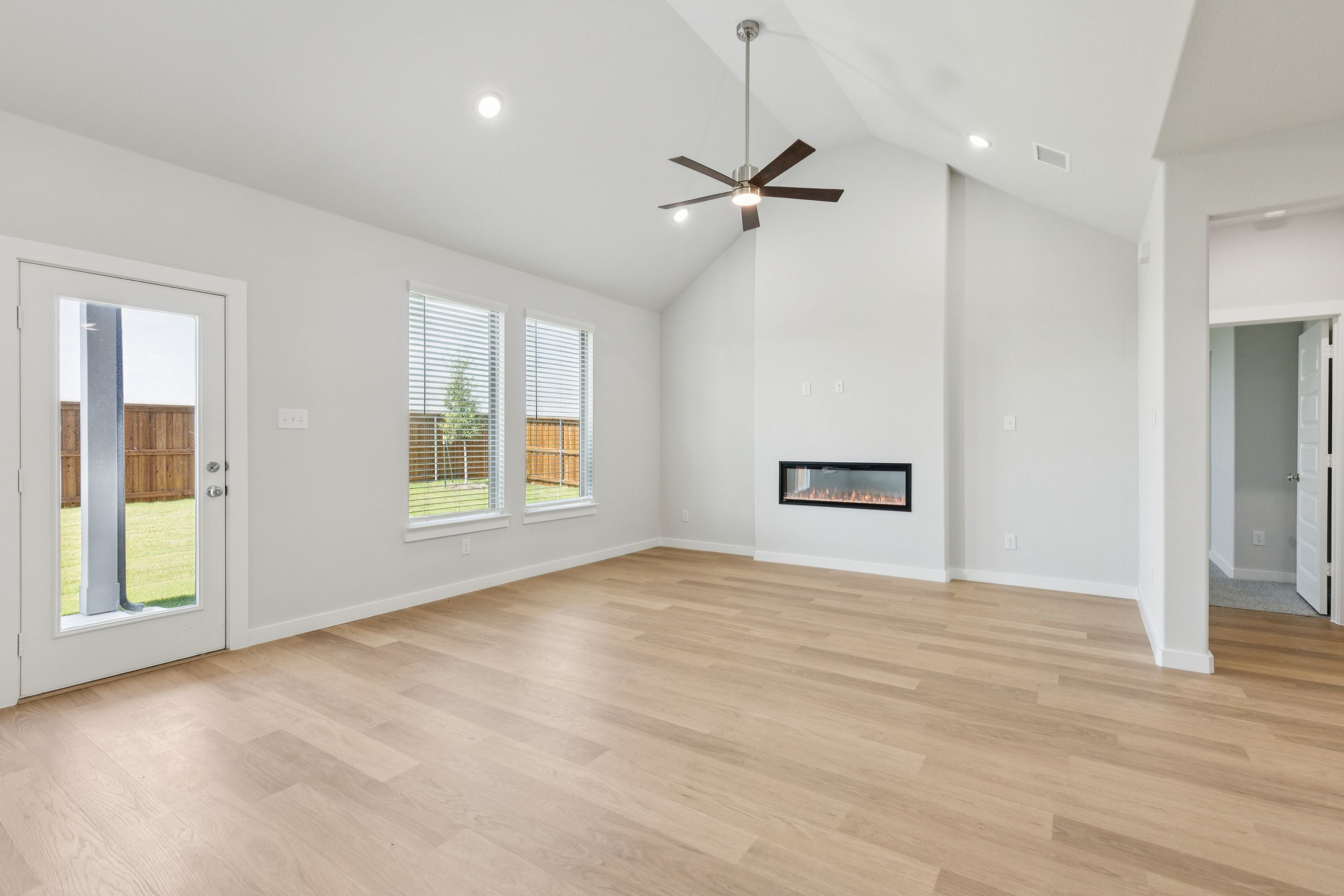 Living Room in the Masters home plan by Trophy Signature Homes – REPRESENTATIVE PHOTO