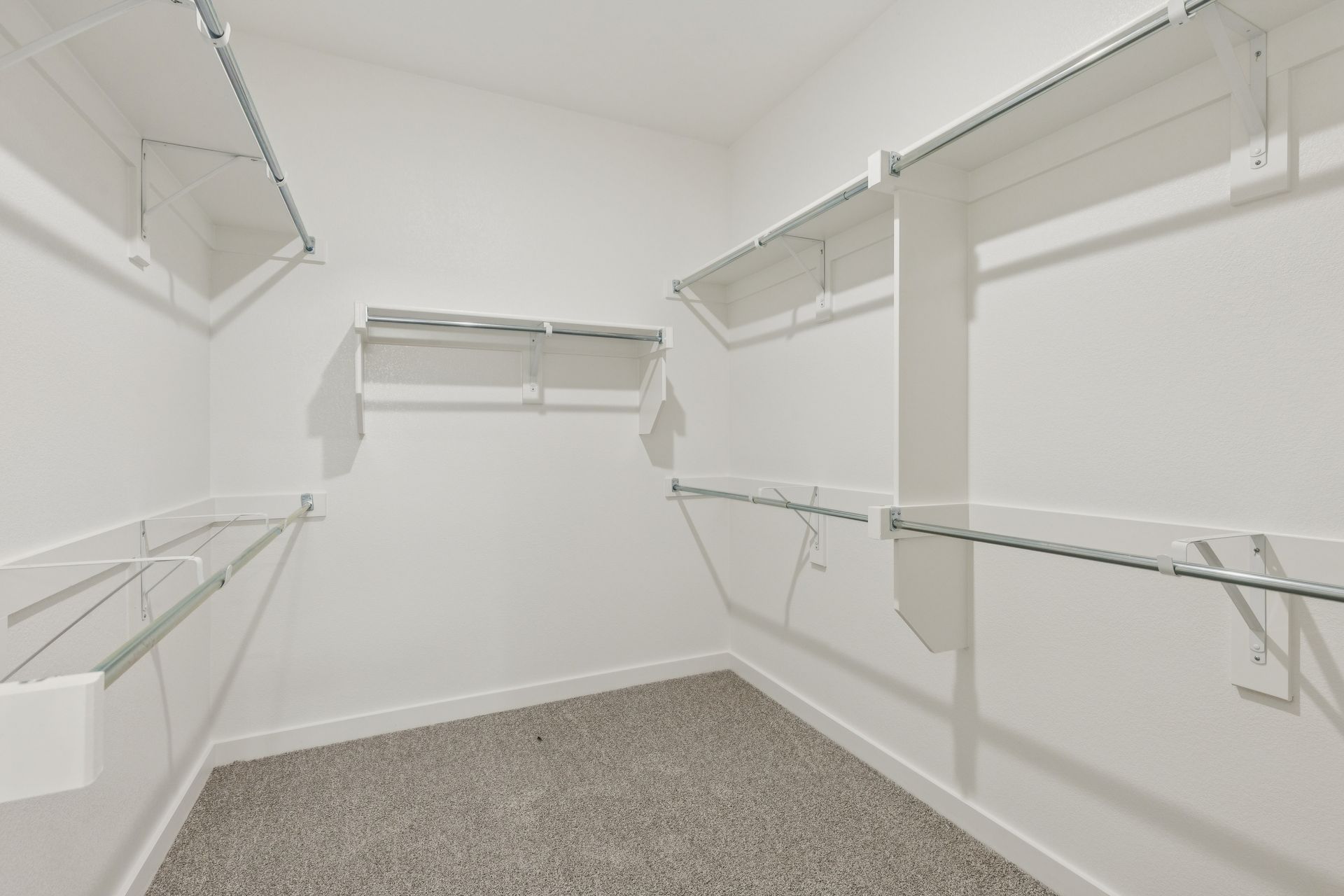 Primary Closet in the Masters home plan by Trophy Signature Homes – REPRESENTATIVE PHOTO