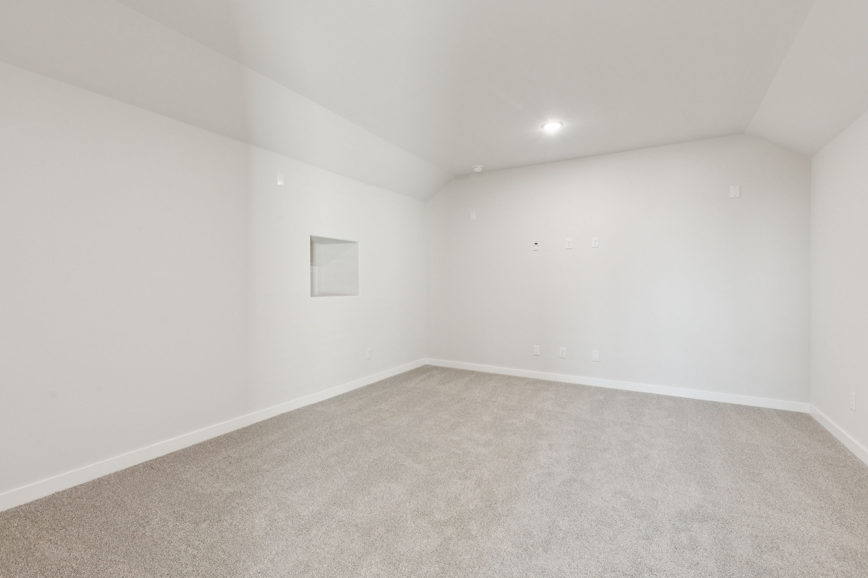Media room in the Masters home plan by Trophy Signature Homes – REPRESENTATIVE PHOTO