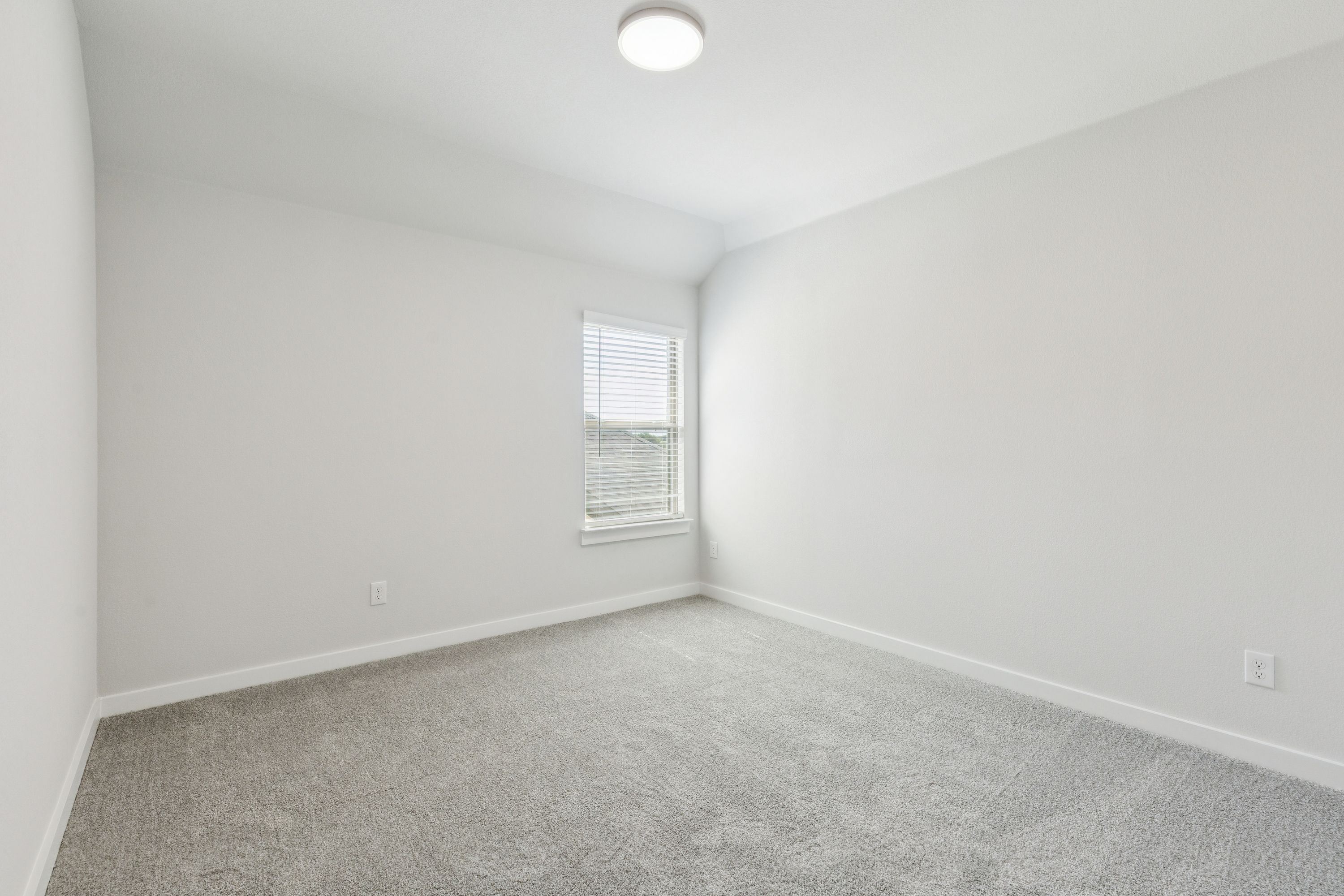 Bedroom in the Masters home plan by Trophy Signature Homes – REPRESENTATIVE PHOTO