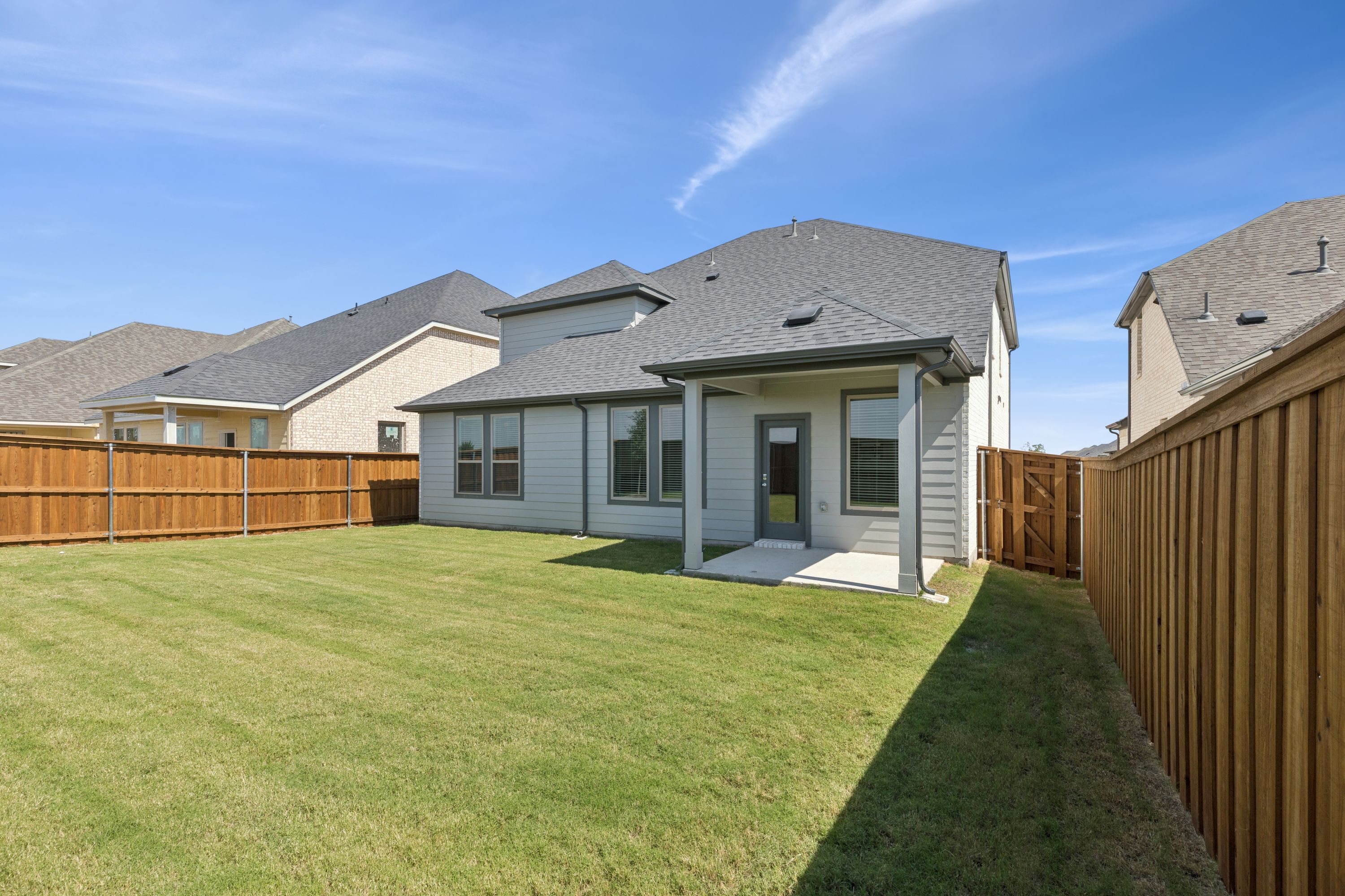Covered Patio in the Masters home plan by Trophy Signature Homes – REPRESENTATIVE PHOTO