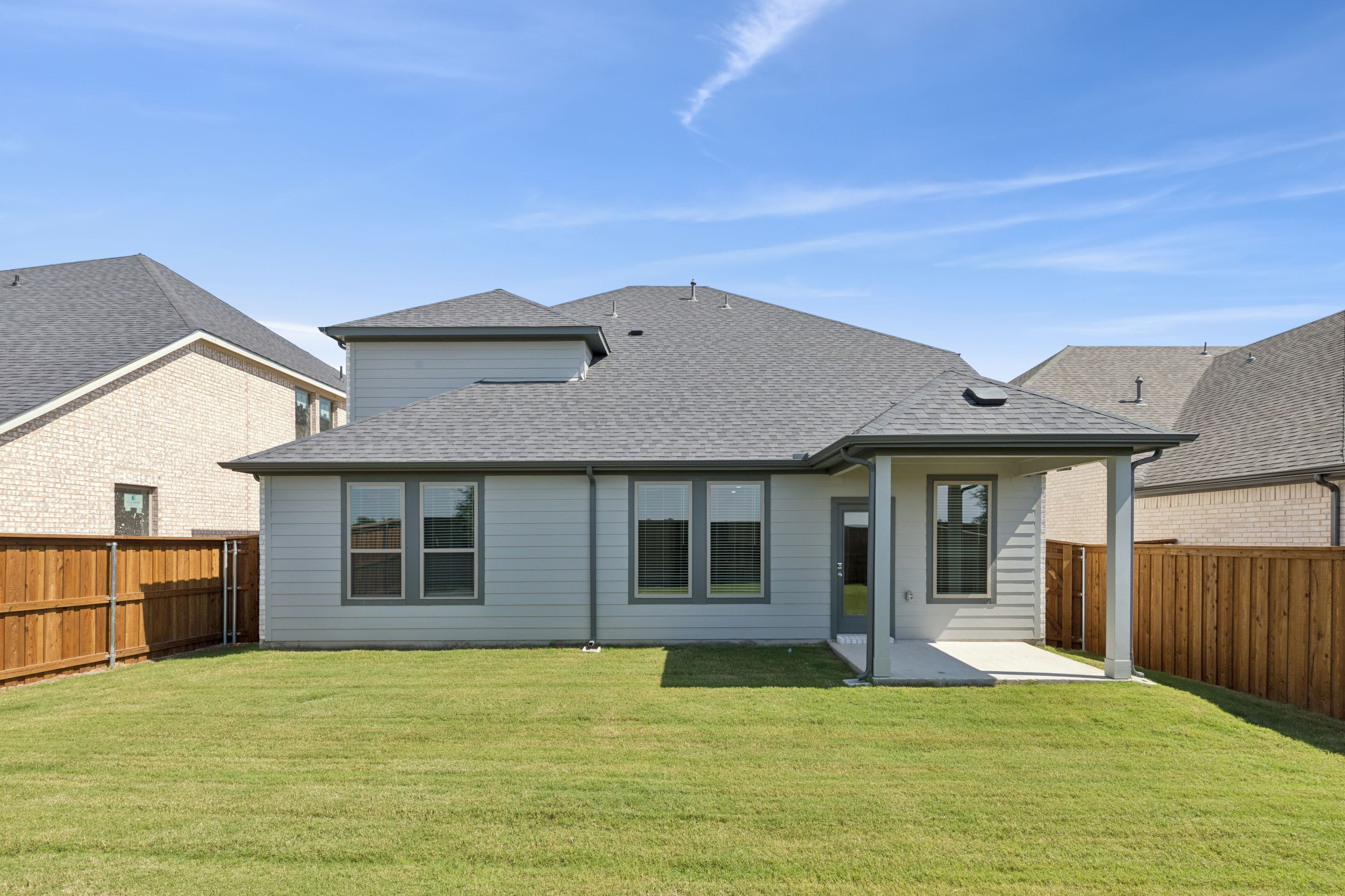 Covered Patio in the Masters home plan by Trophy Signature Homes – REPRESENTATIVE PHOTO