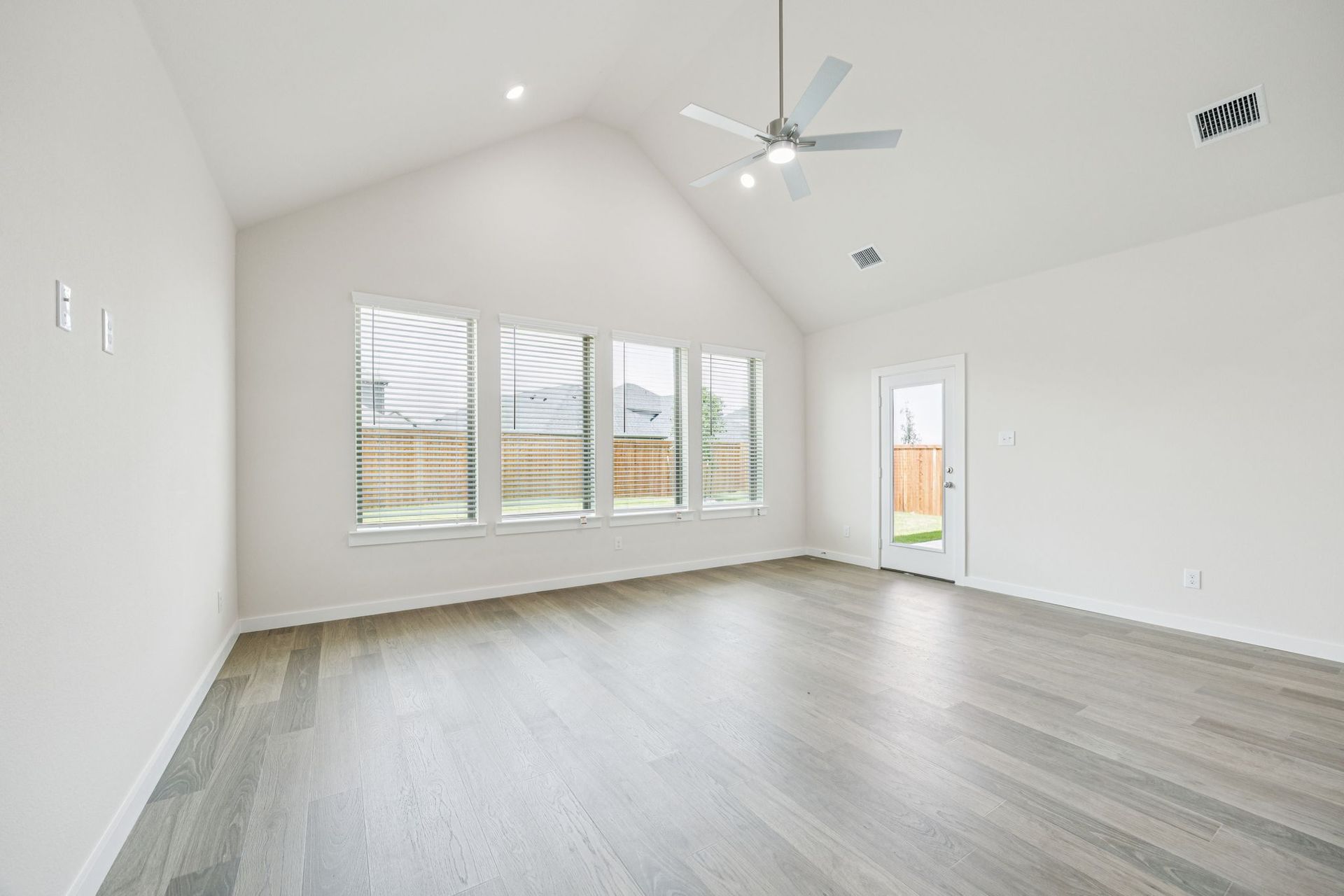 Living Room in the Claret home plan by Trophy Signature Homes – REPRESENTATIVE PHOTO