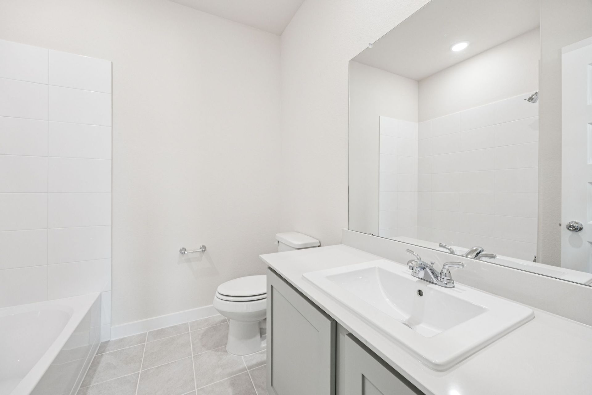 Bathroom in the Claret home plan by Trophy Signature Homes – REPRESENTATIVE PHOTO