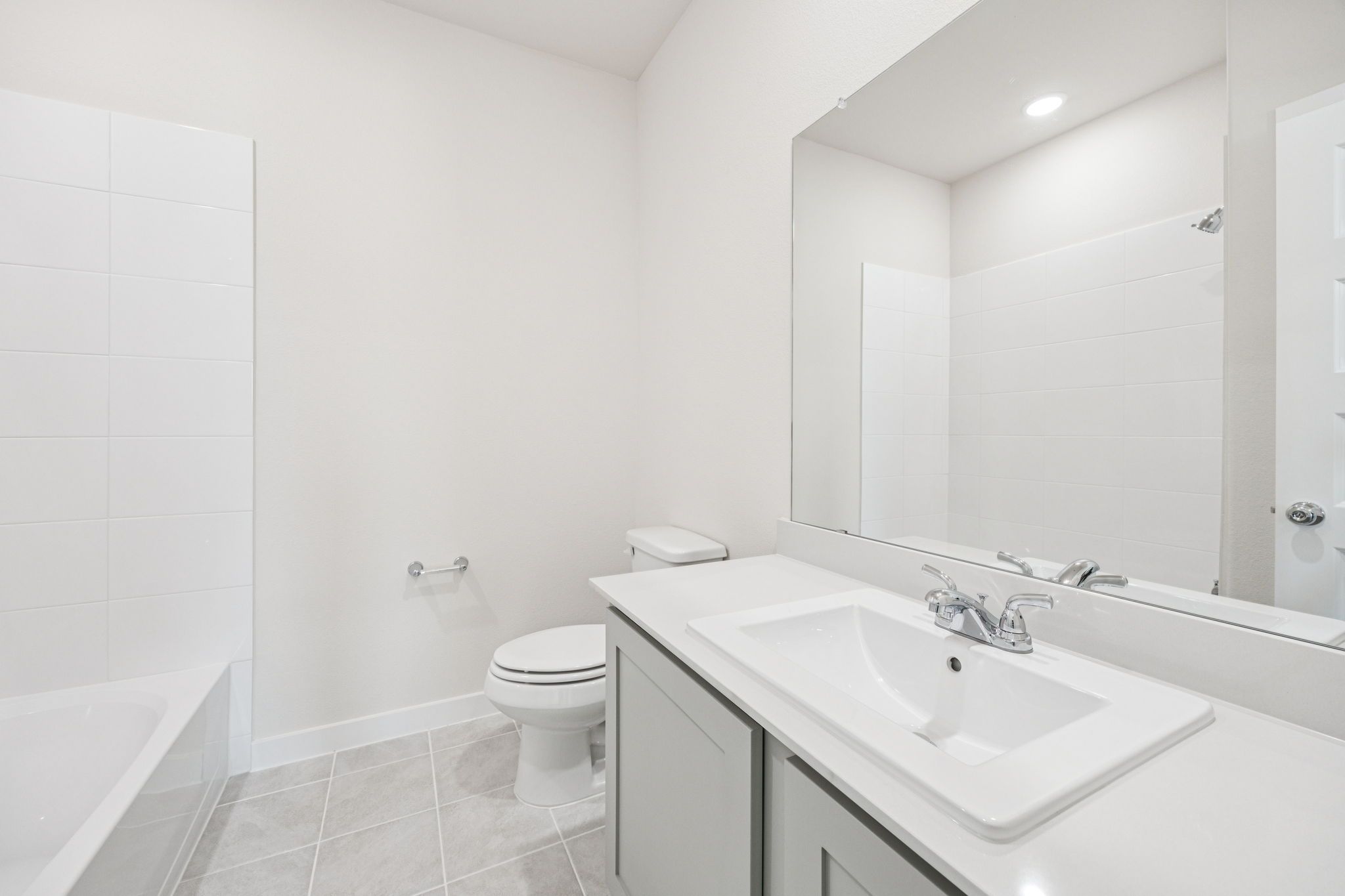 Bathroom in the Claret home plan by Trophy Signature Homes – REPRESENTATIVE PHOTO