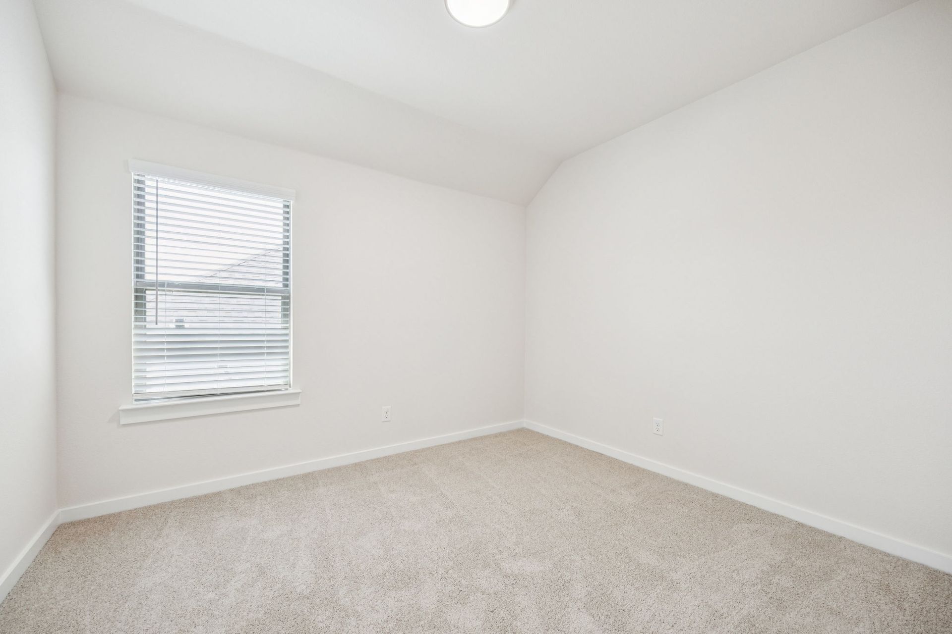 Bedroom in the Claret home plan by Trophy Signature Homes – REPRESENTATIVE PHOTO