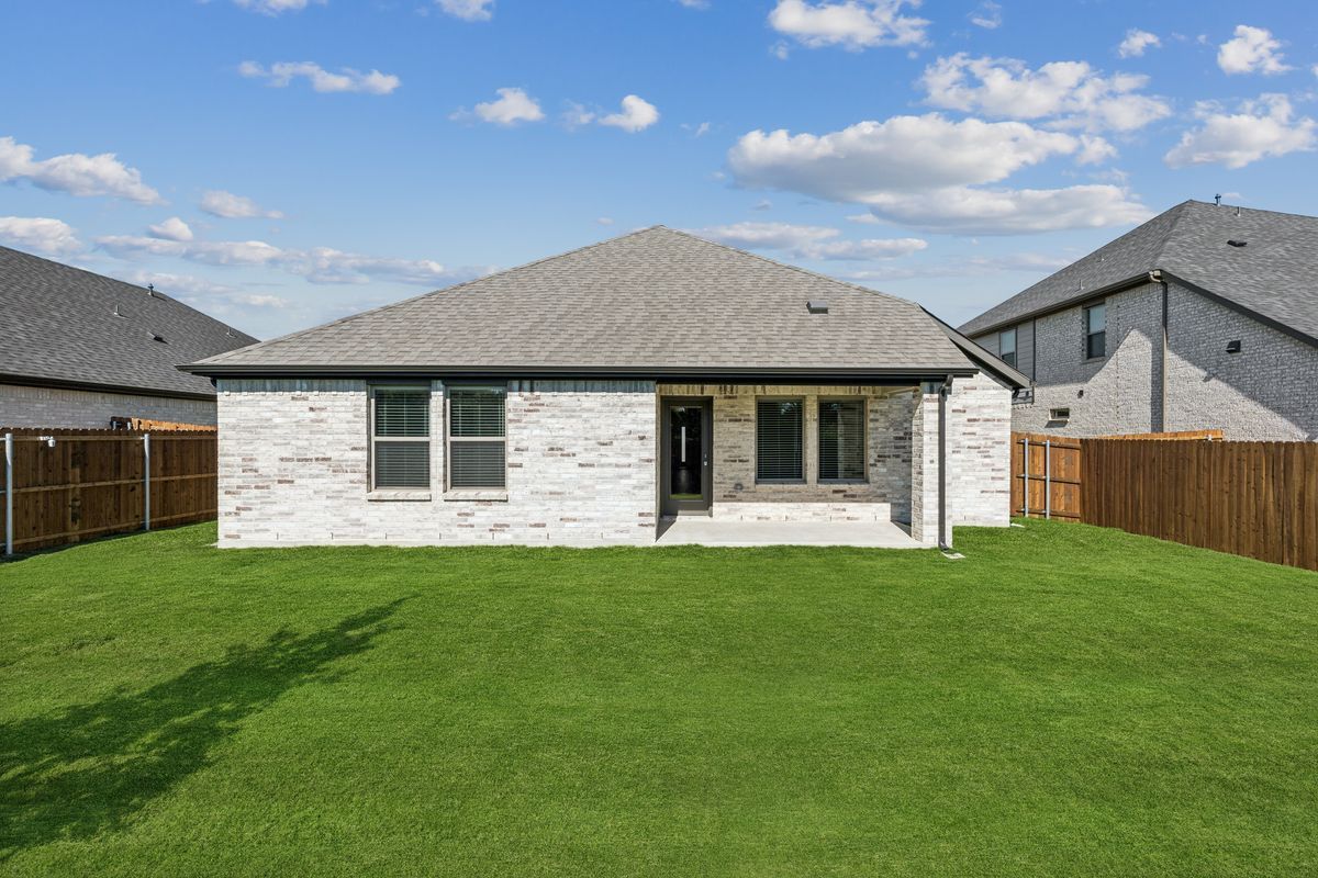 Covered Patio in the Oscar home plan by Trophy Signature Homes – REPRESENTATIVE PHOTO