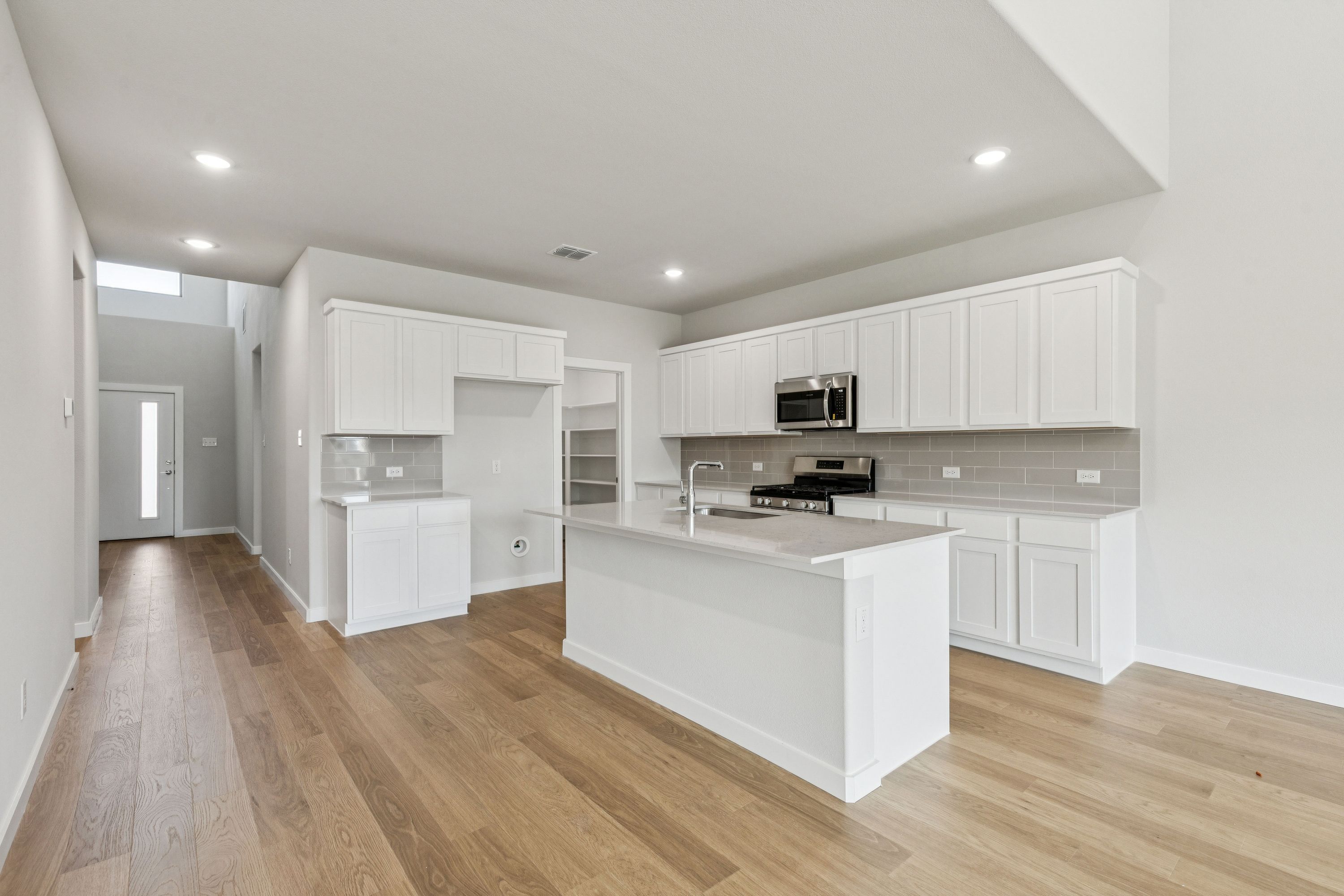 Kitchen in the Winters home plan by Trophy Signature Homes – REPRESENTATIVE PHOTO