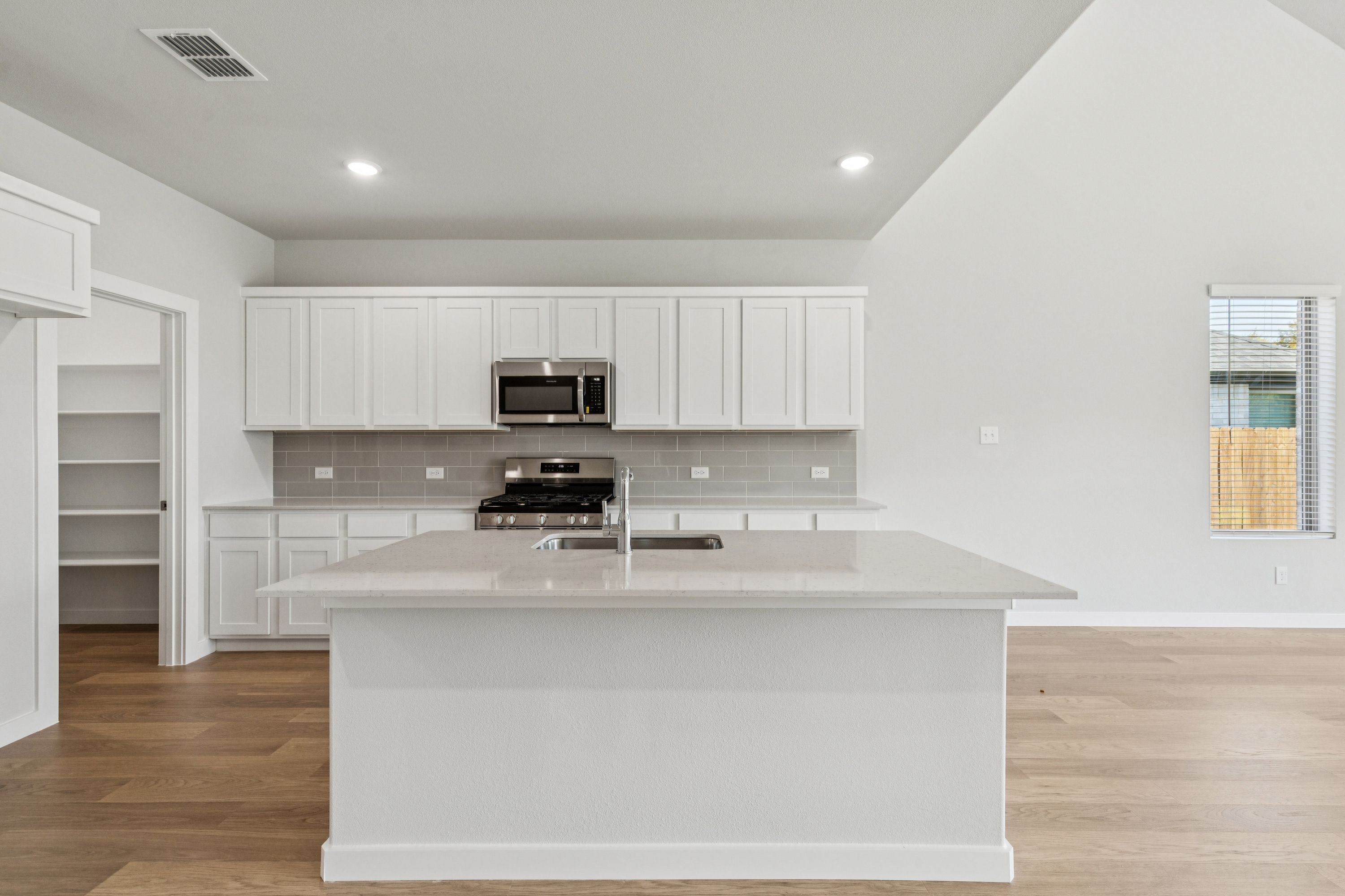Kitchen in the Winters home plan by Trophy Signature Homes – REPRESENTATIVE PHOTO