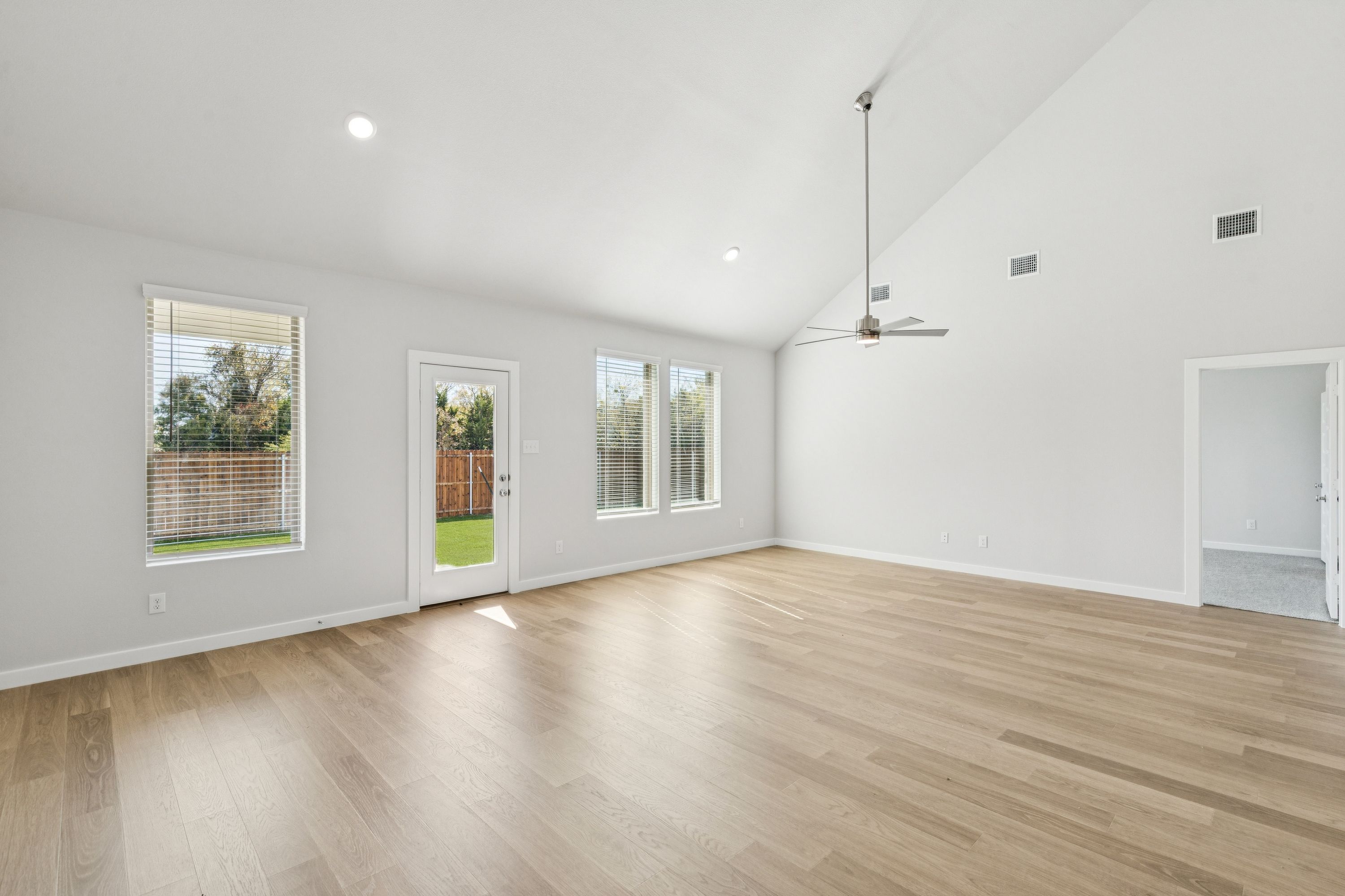 Living and Dining Rooms in the Winters home plan by Trophy Signature Homes – REPRESENTATIVE PHOTO