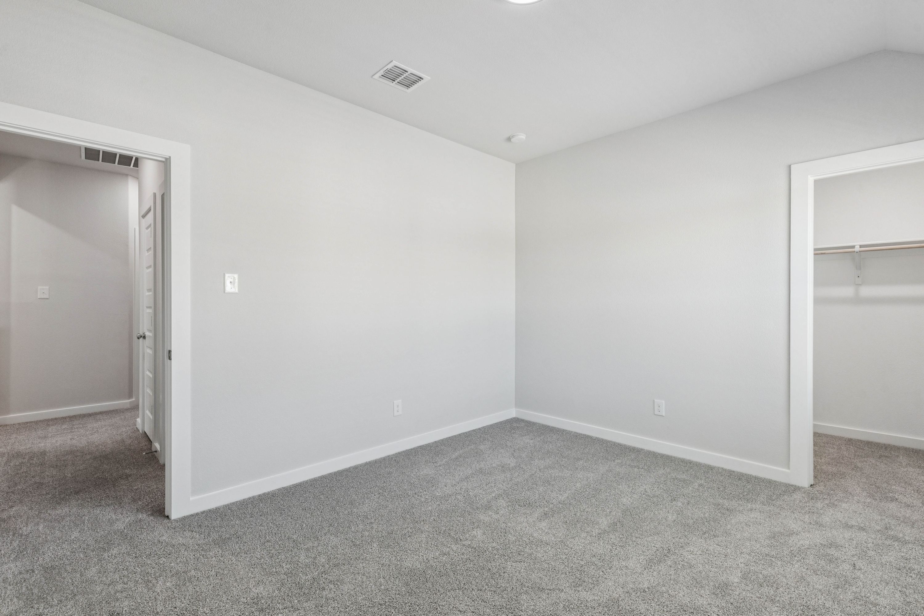 Bedroom in the Winters home plan by Trophy Signature Homes – REPRESENTATIVE PHOTO