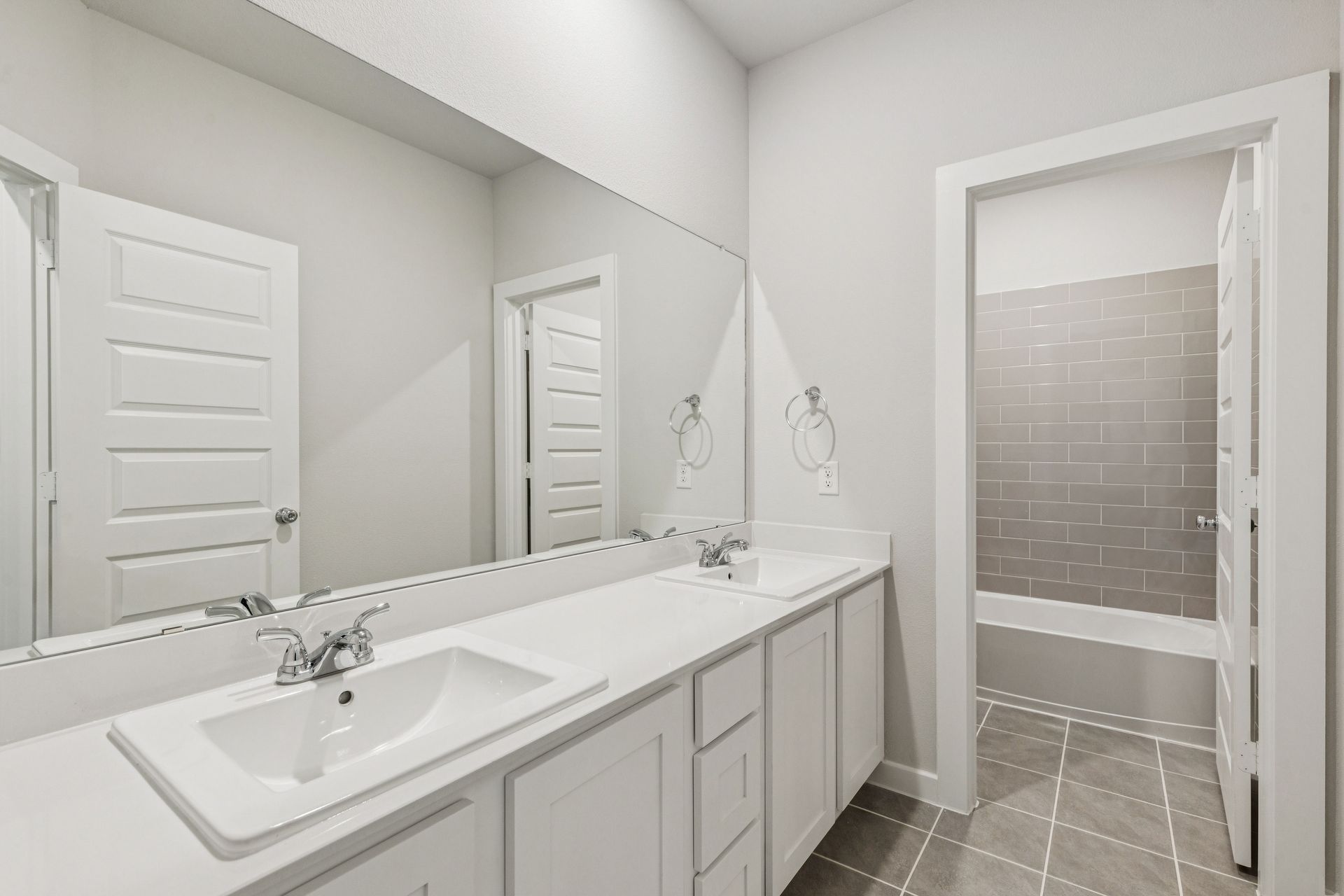 Bathroom in the Winters home plan by Trophy Signature Homes – REPRESENTATIVE PHOTO