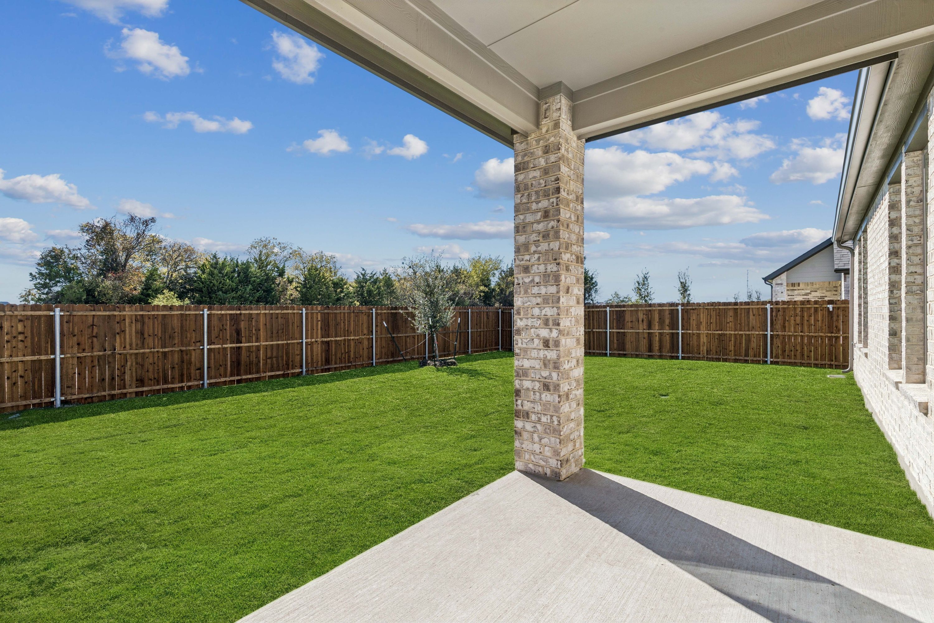 Covered Patio in the Winters home plan by Trophy Signature Homes – REPRESENTATIVE PHOTO