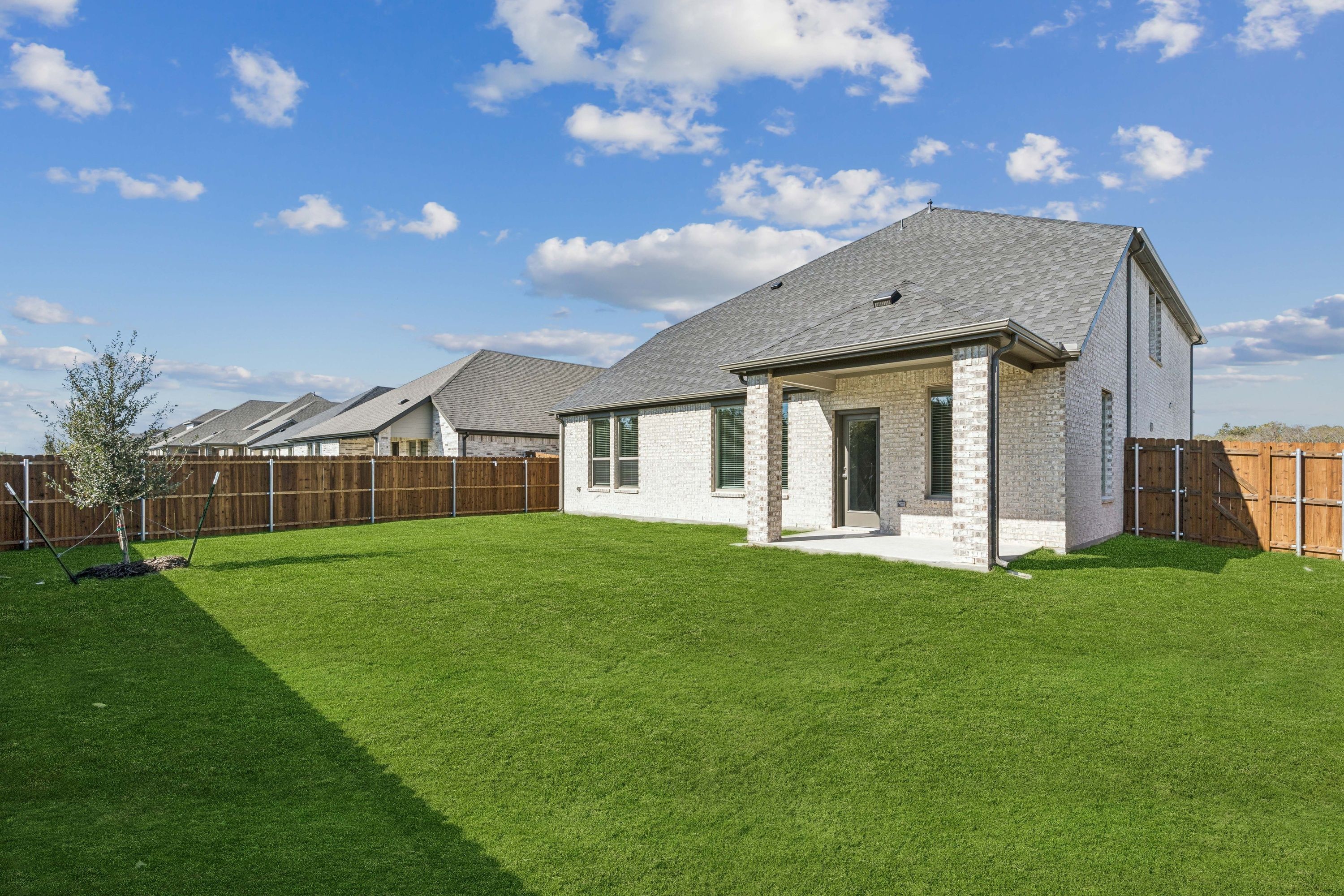 Covered Patio in the Winters home plan by Trophy Signature Homes – REPRESENTATIVE PHOTO