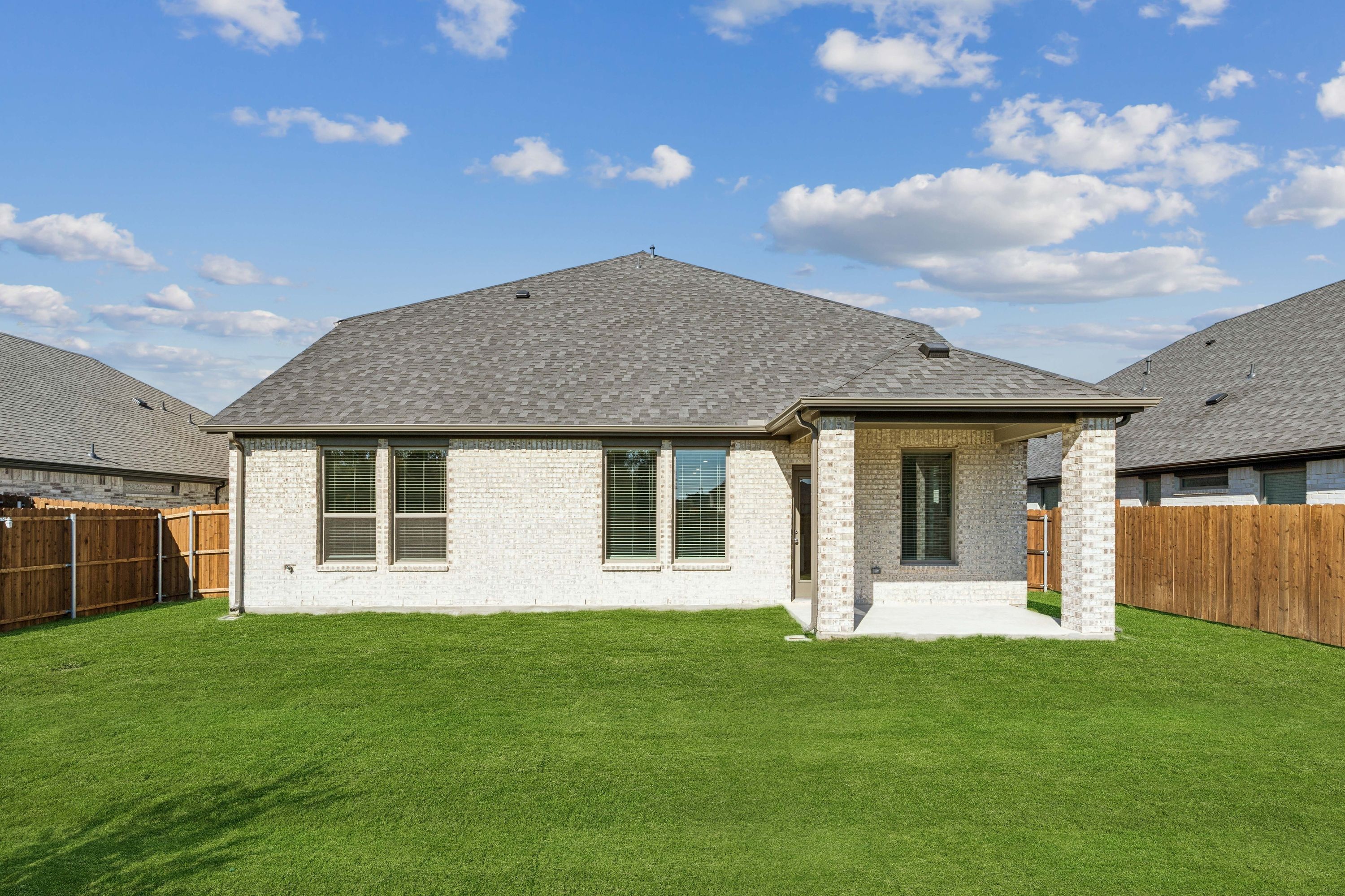 Covered Patio in the Winters home plan by Trophy Signature Homes – REPRESENTATIVE PHOTO