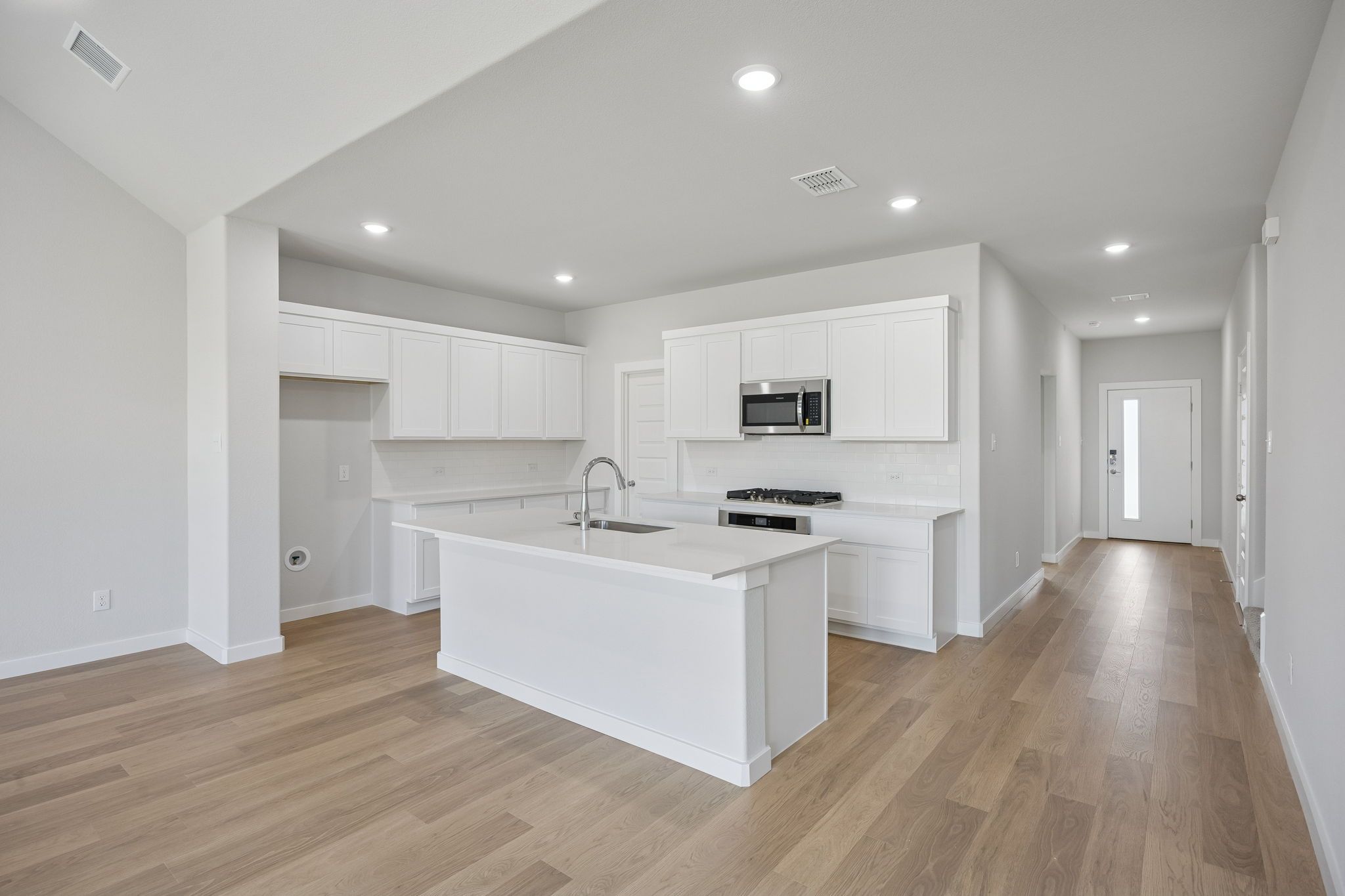 Kitchen in the Masters home plan by Trophy Signature Homes – REPRESENTATIVE PHOTO