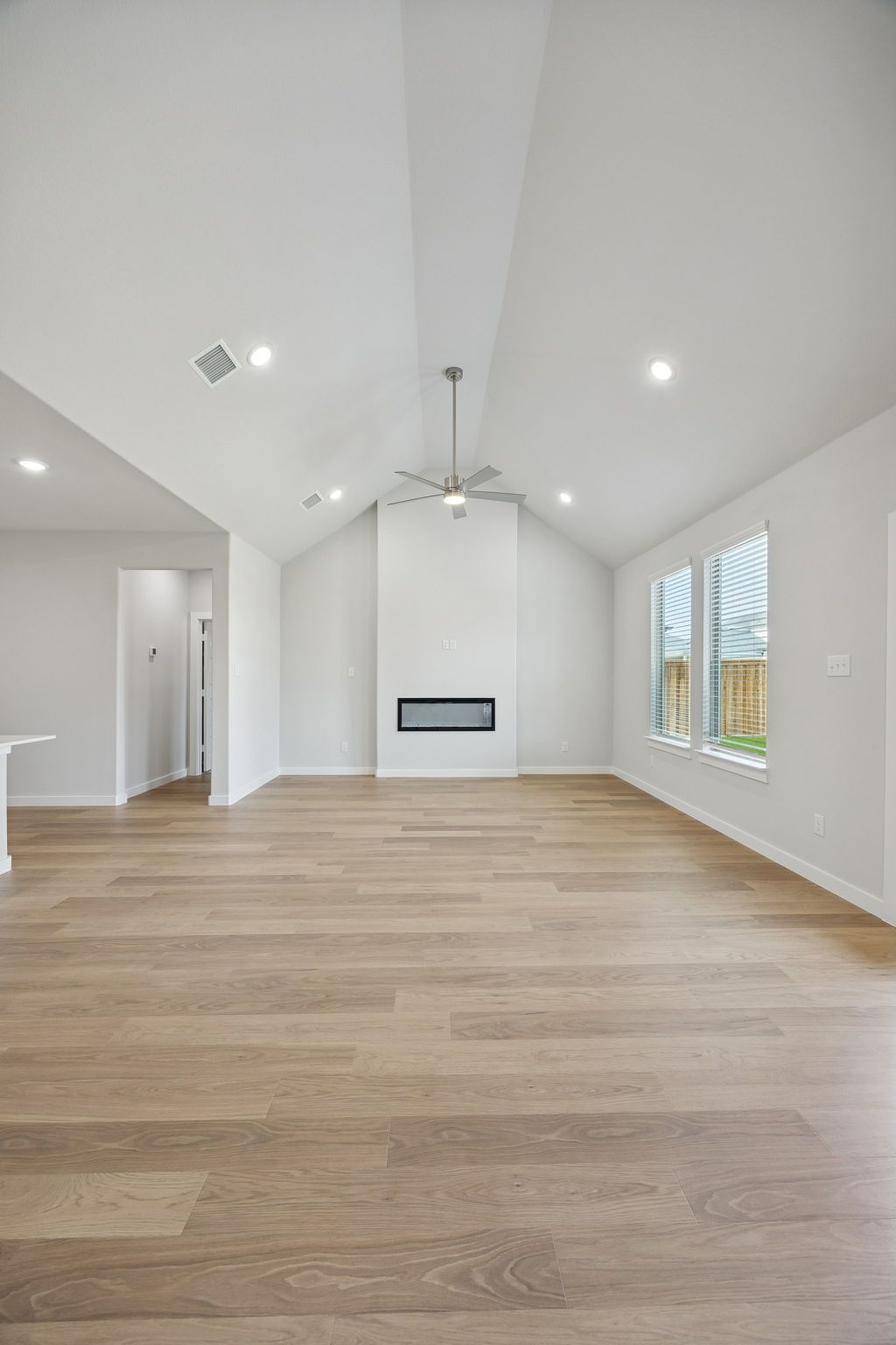 Living Room in the Masters home plan by Trophy Signature Homes – REPRESENTATIVE PHOTO