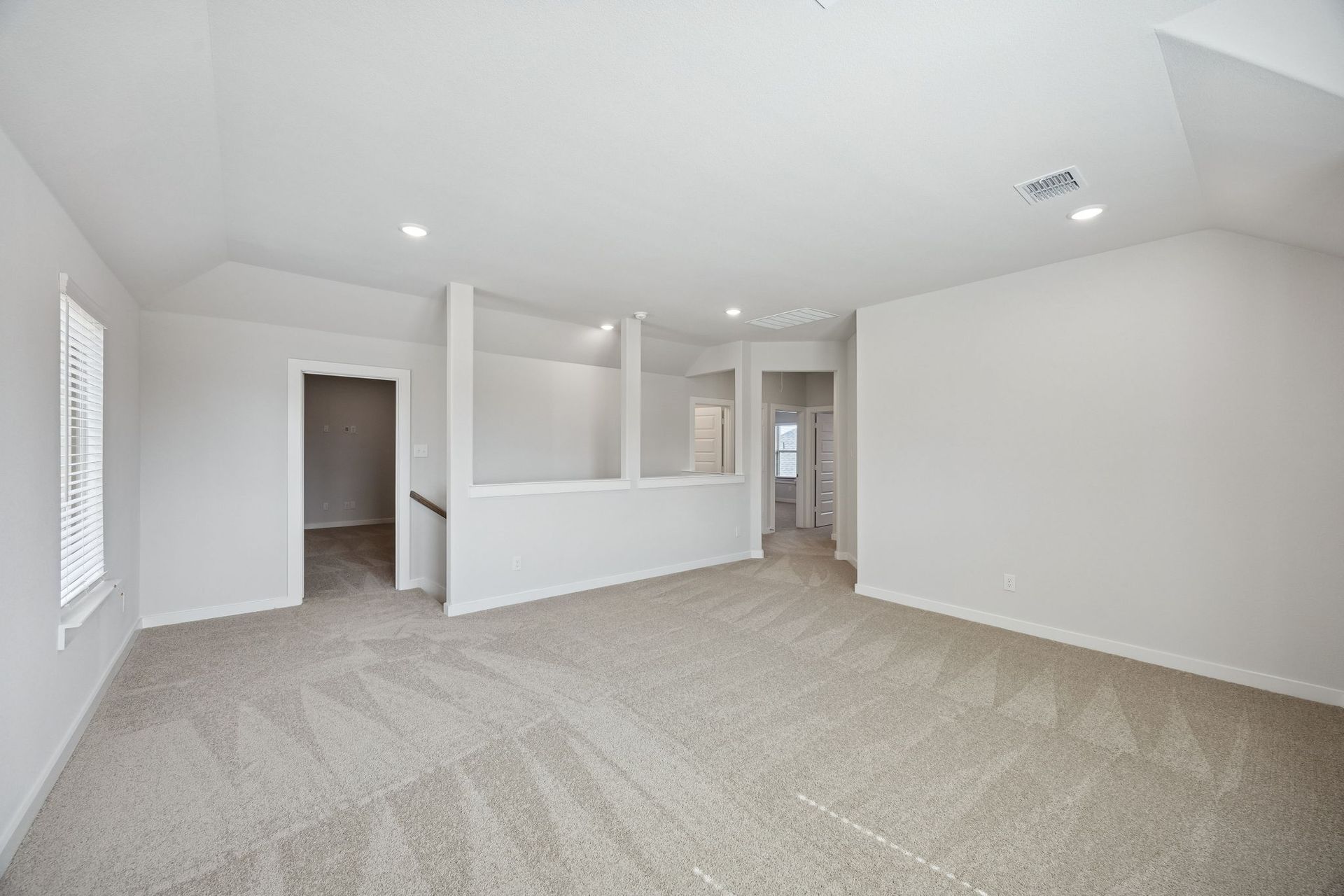 Game room in the Masters home plan by Trophy Signature Homes – REPRESENTATIVE PHOTO