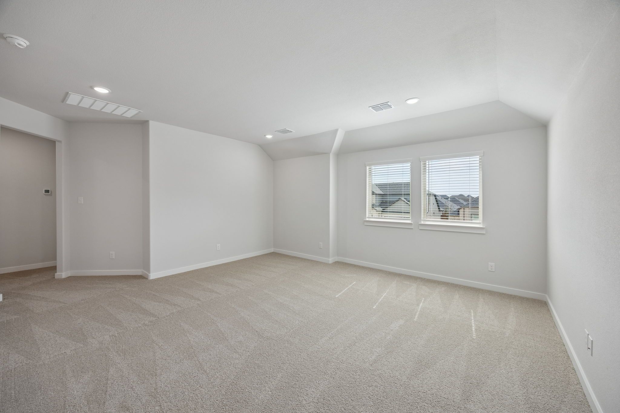 Game room in the Masters home plan by Trophy Signature Homes – REPRESENTATIVE PHOTO