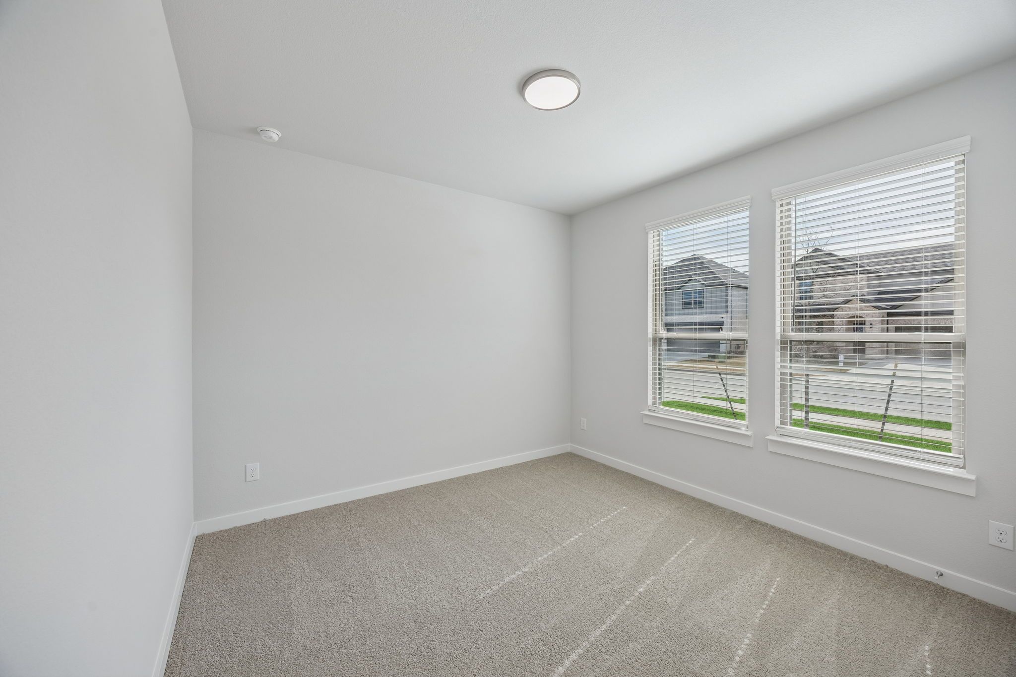 Bedroom in the Masters home plan by Trophy Signature Homes – REPRESENTATIVE PHOTO