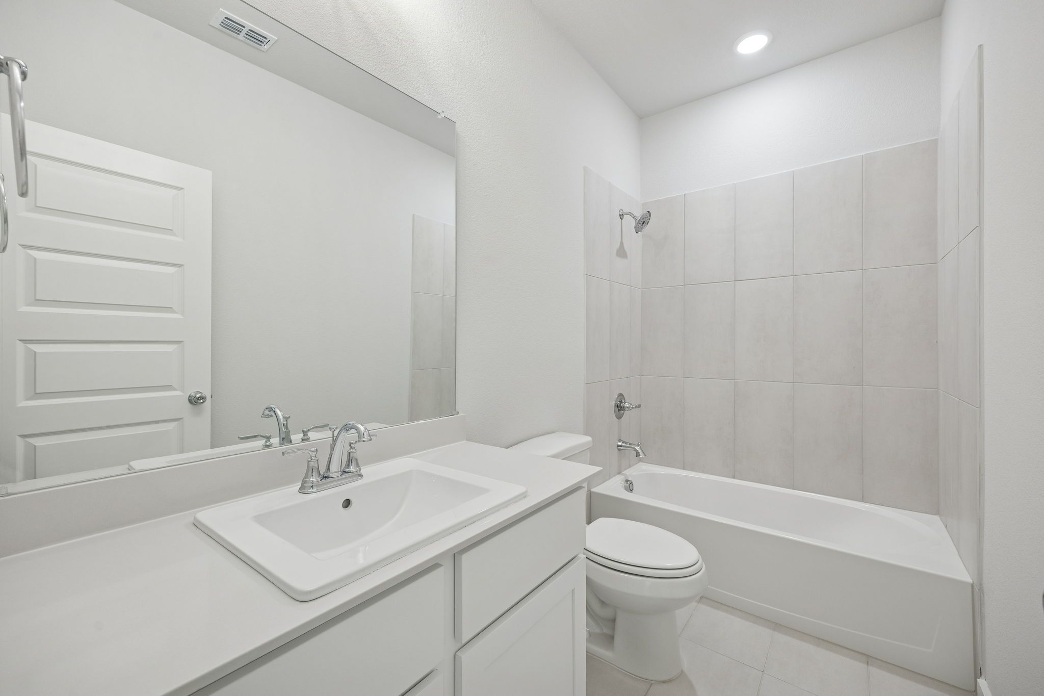 Bathroom in the Masters home plan by Trophy Signature Homes – REPRESENTATIVE PHOTO