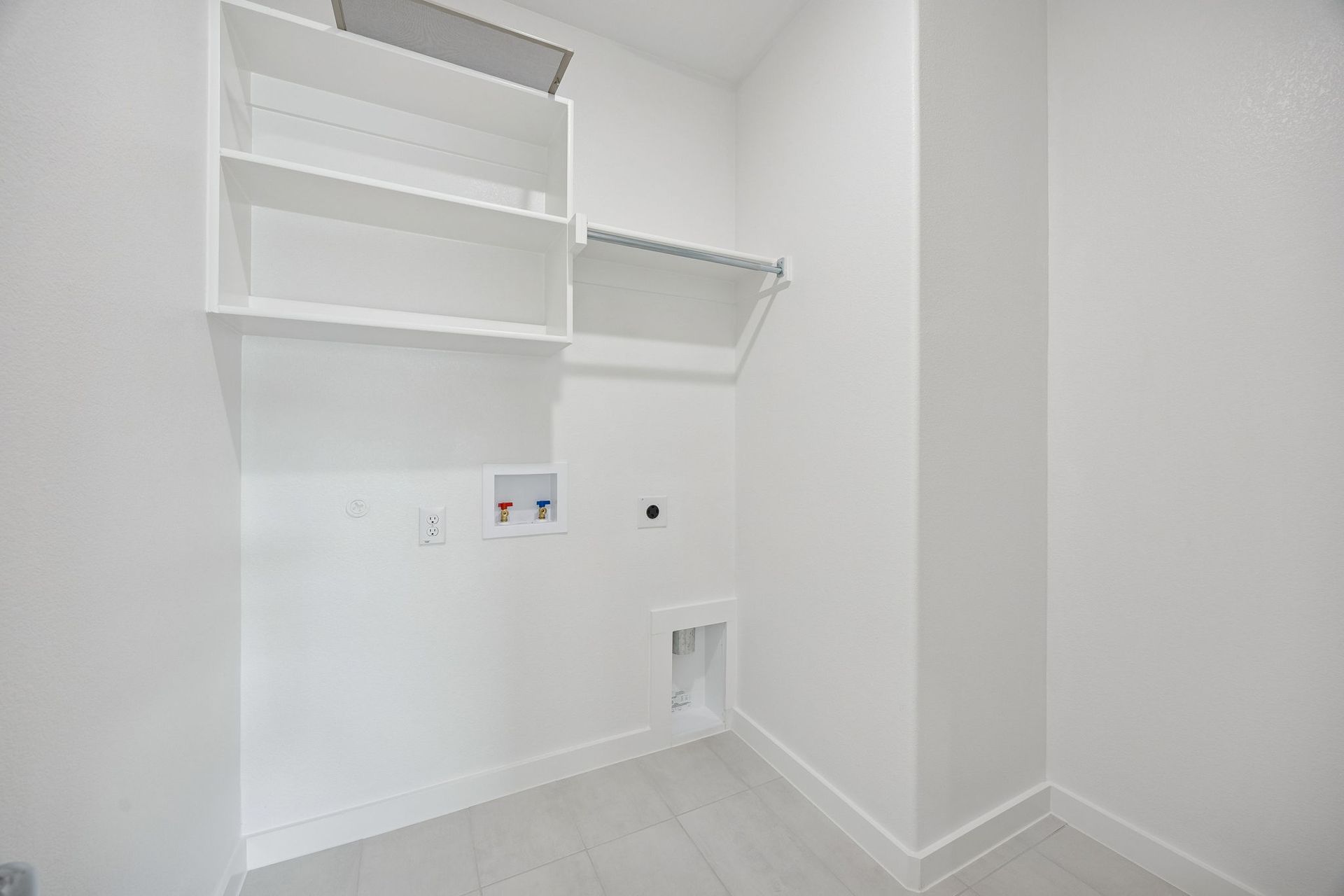 Utility Room in the Masters home plan by Trophy Signature Homes – REPRESENTATIVE PHOTO