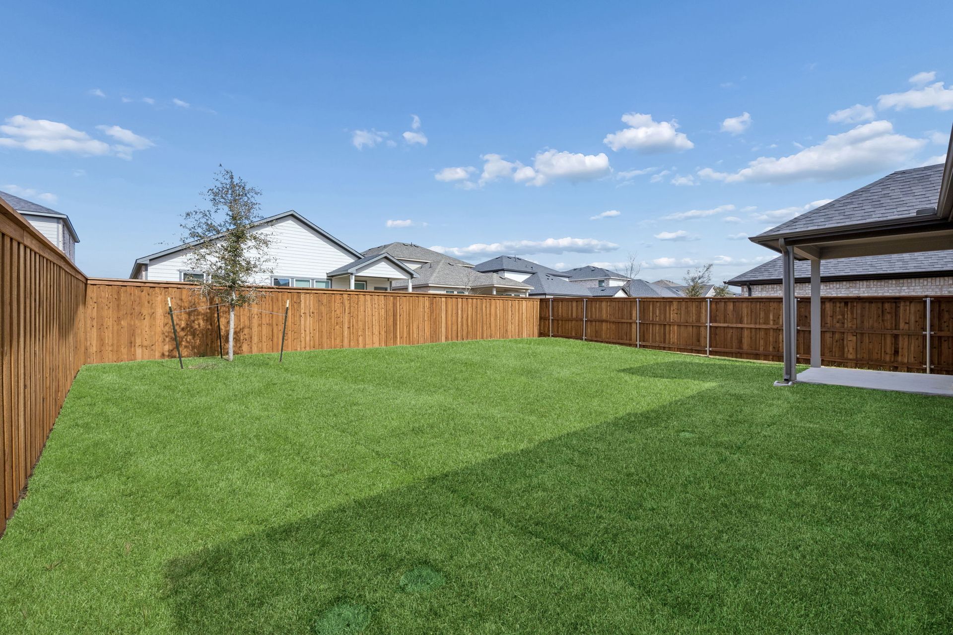 Covered Patio in the Masters home plan by Trophy Signature Homes – REPRESENTATIVE PHOTO