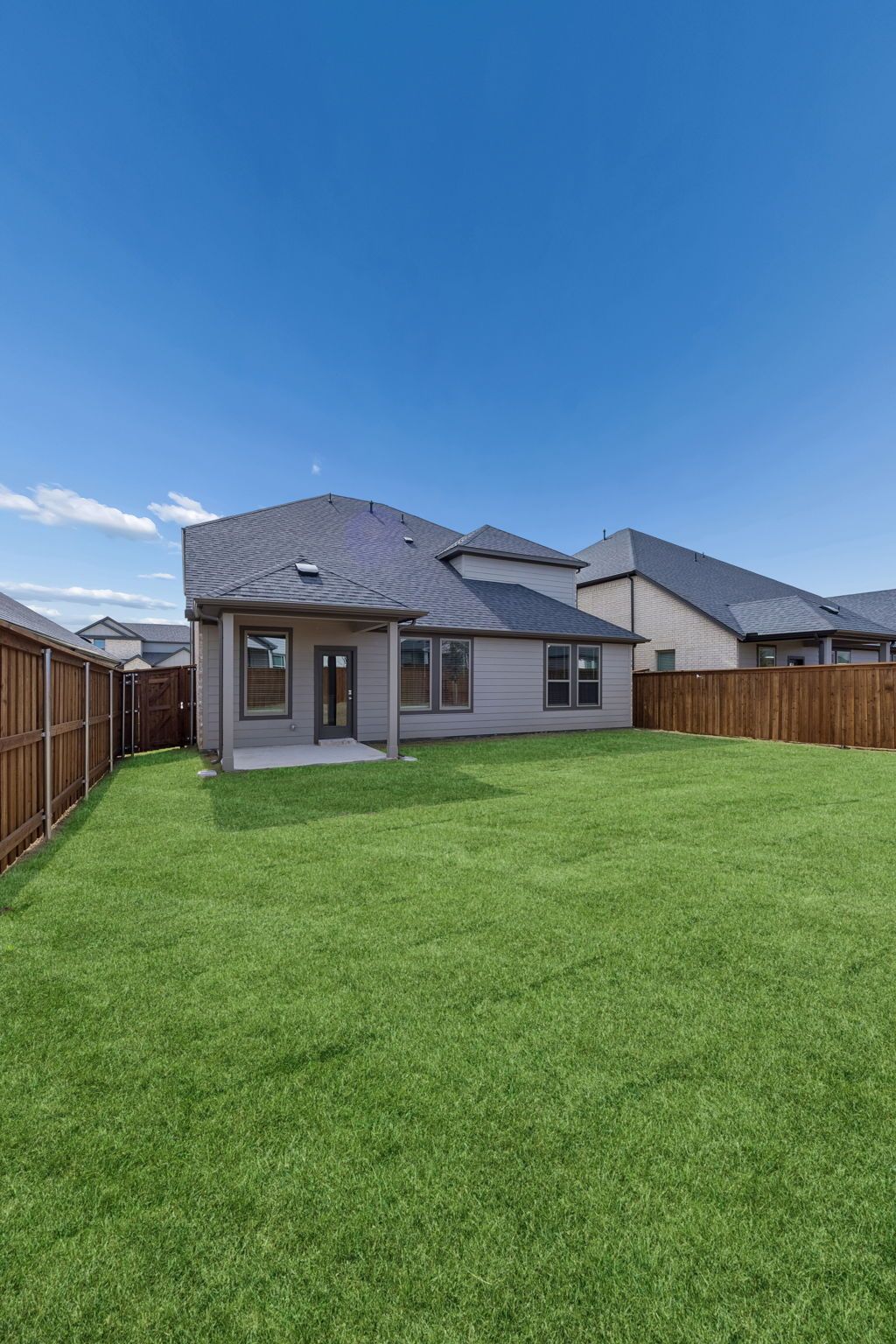 Covered Patio in the Masters home plan by Trophy Signature Homes – REPRESENTATIVE PHOTO
