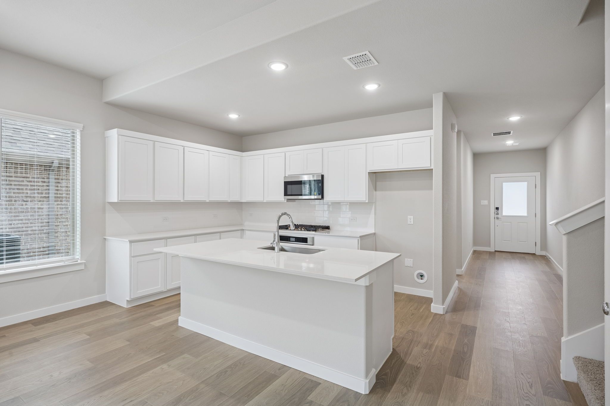 Kitchen in the Stanley II home plan by Trophy Signature Homes – REPRESENTATIVE PHOTO