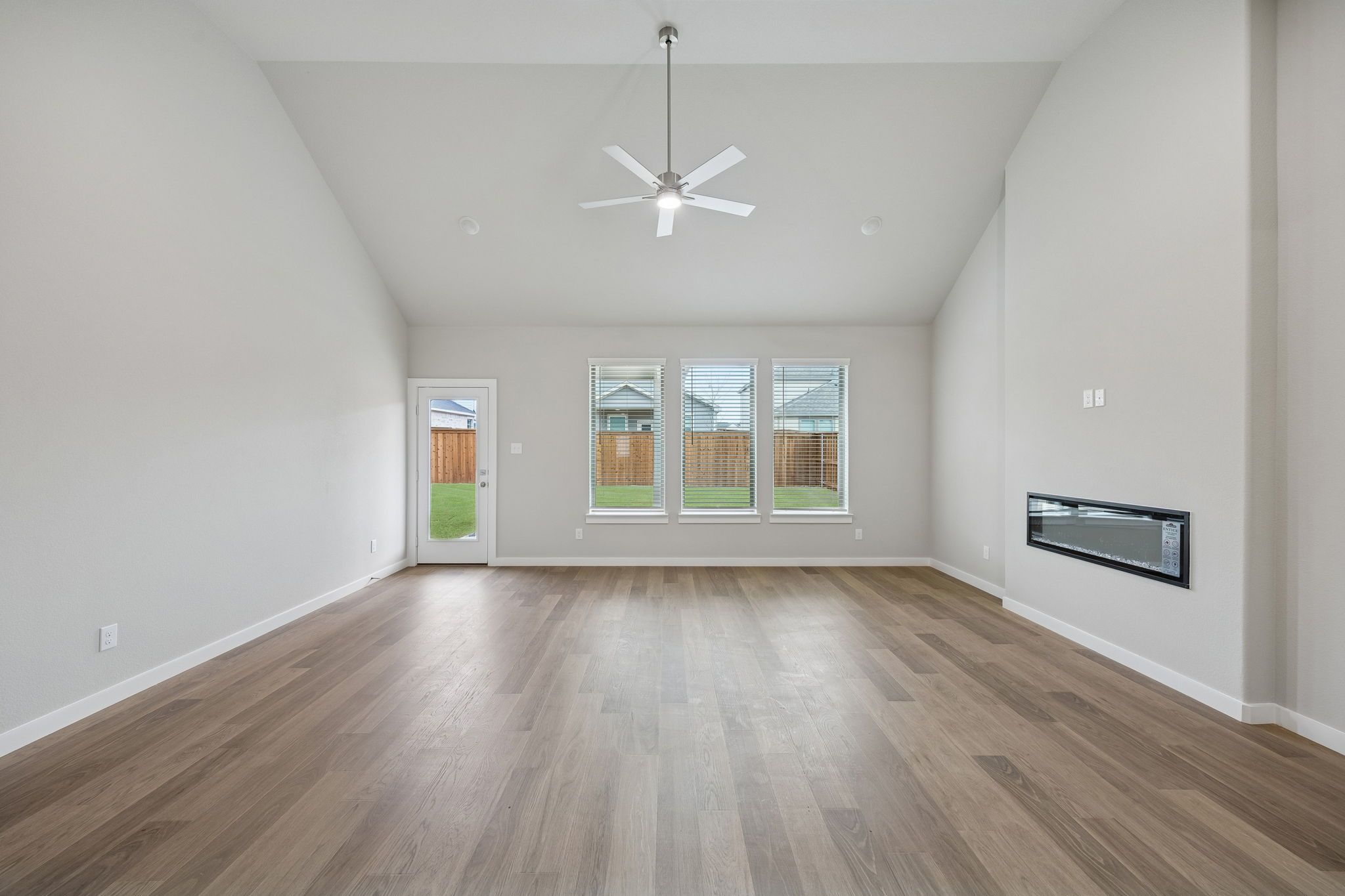 Living Room in the Stanley II home plan by Trophy Signature Homes – REPRESENTATIVE PHOTO