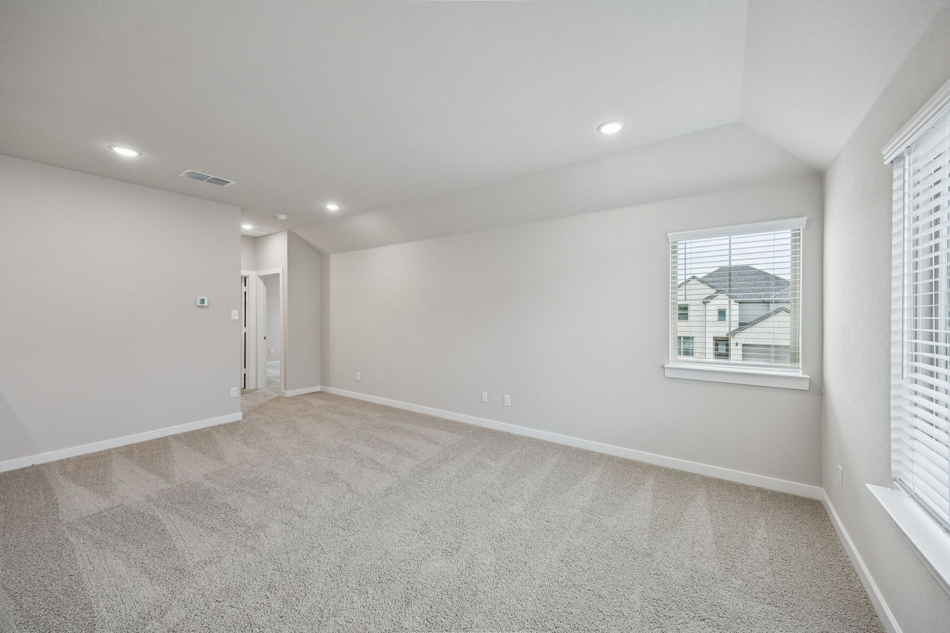 Game Room in the Stanley II home plan by Trophy Signature Homes – REPRESENTATIVE PHOTO