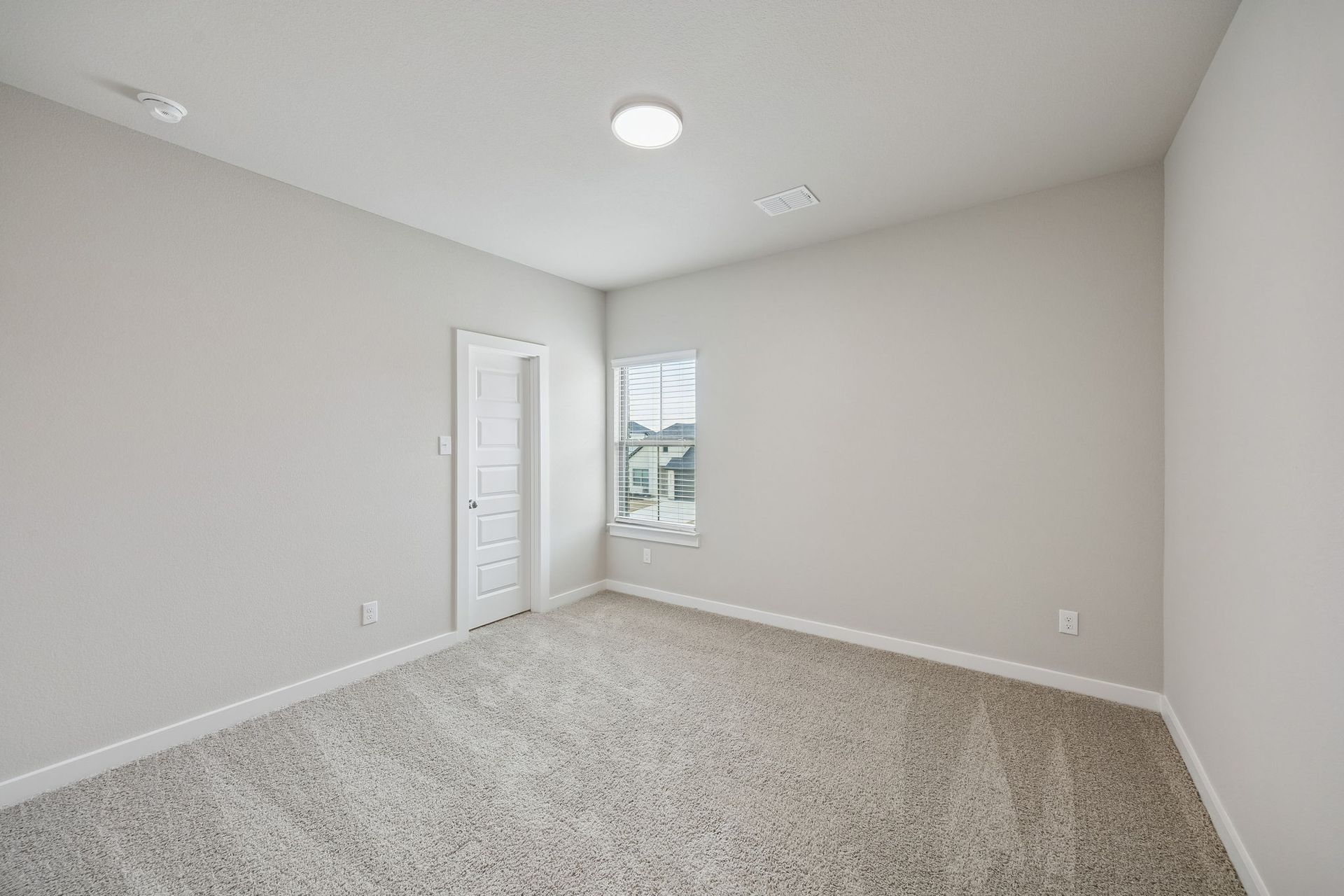 Bedroom in the Stanley II home plan by Trophy Signature Homes – REPRESENTATIVE PHOTO